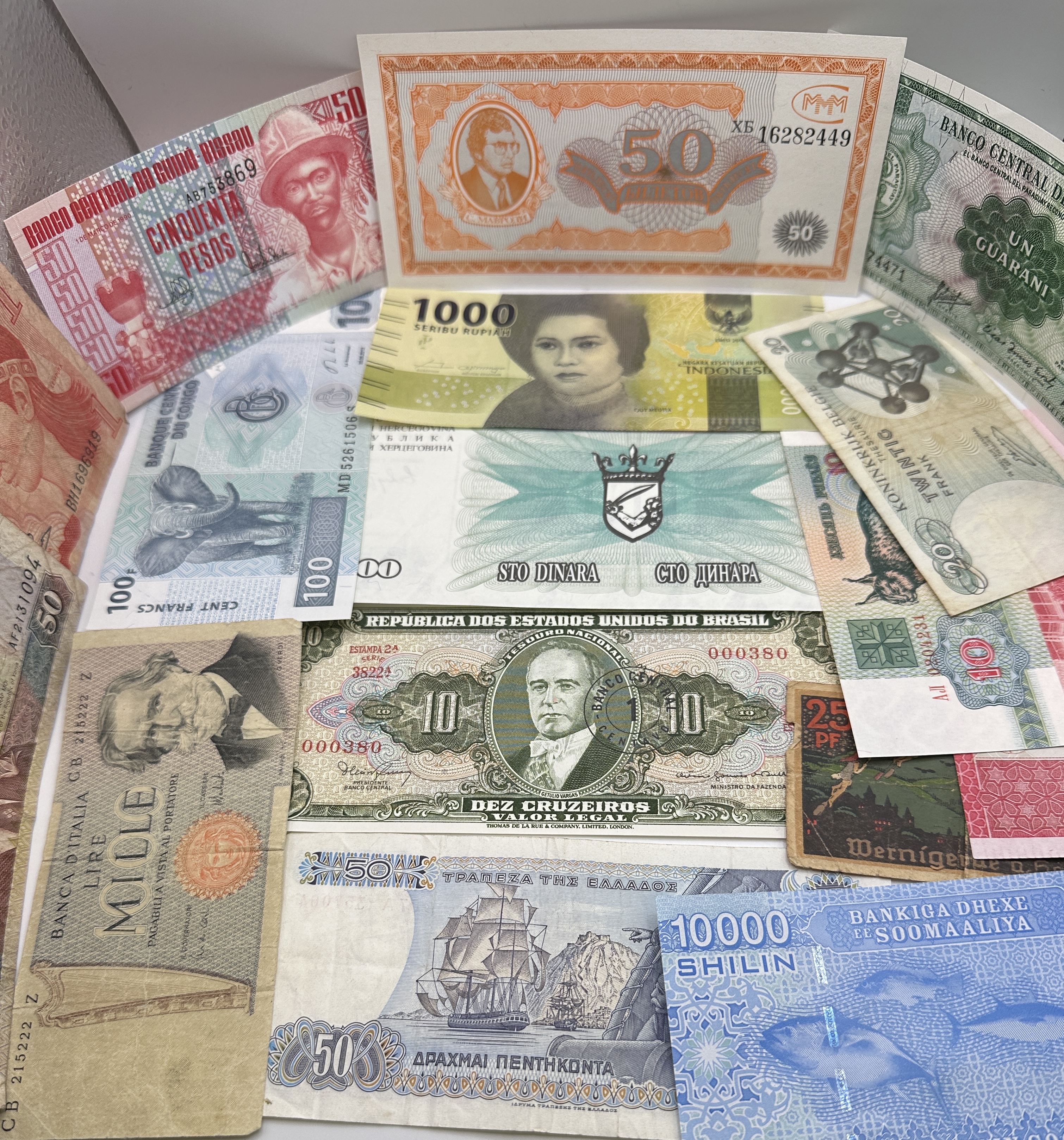 A Collection of International Banknotes and Currency Ephemera including Italy Brazil Somalia and Russia
