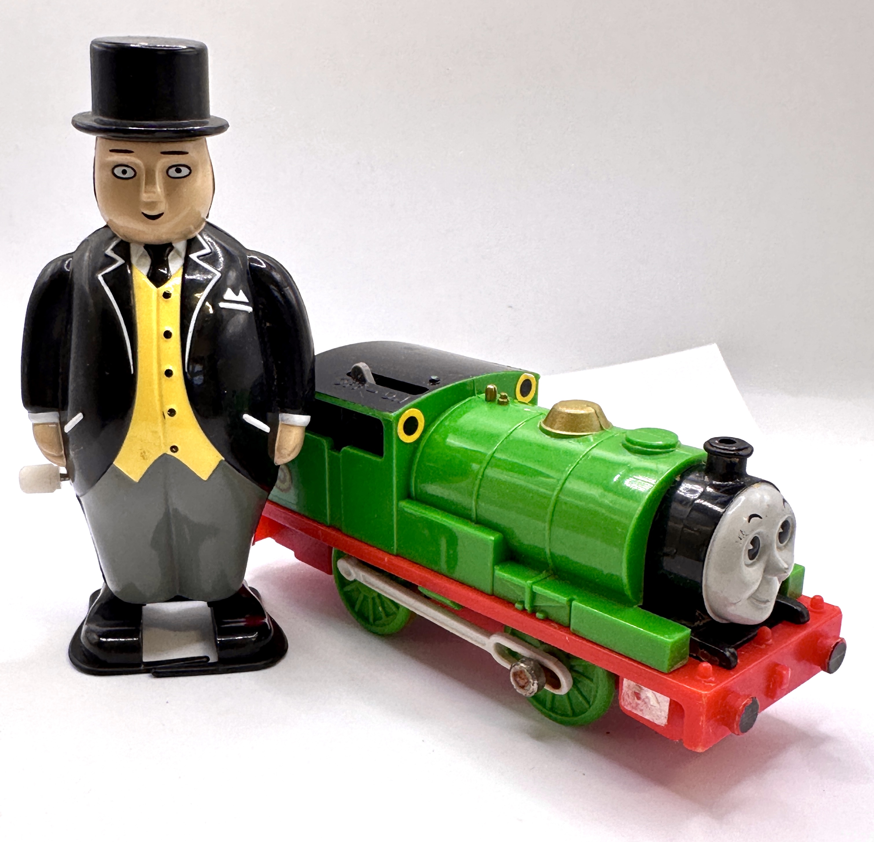 A Pair of Thomas & Friends Tomy Toys comprising Percy the Small Engine and Sir Topham Hatt