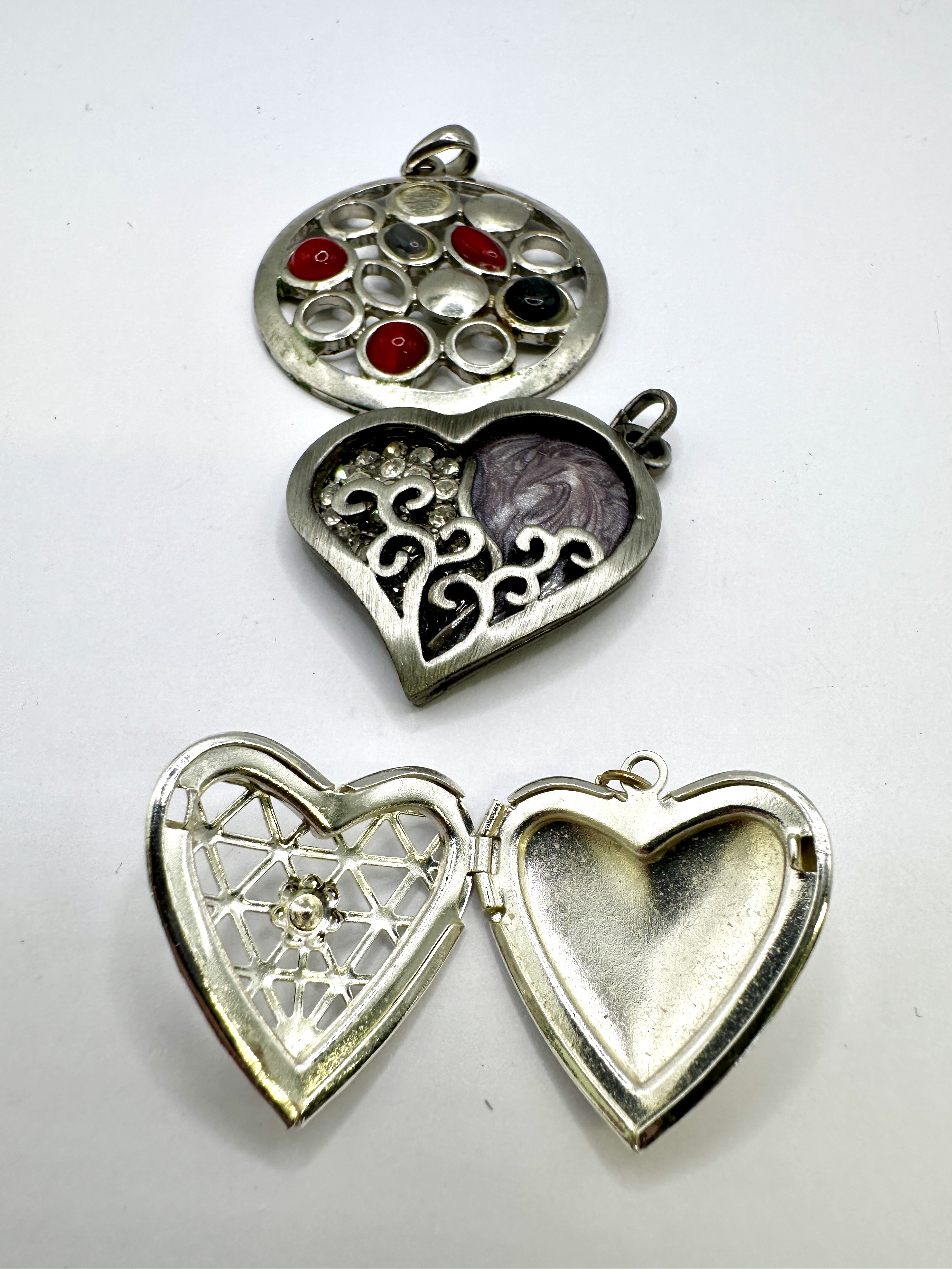 A Trio of Assorted Silver-Toned Costume Jewellery Pendants