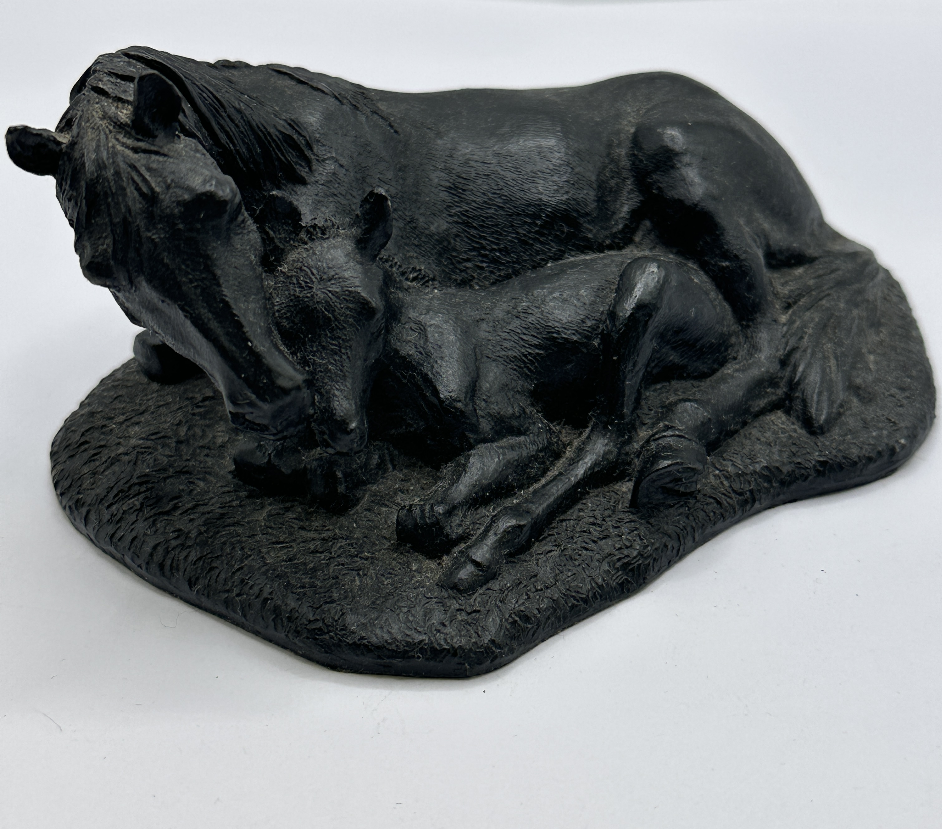 A Welsh Coal Craft Sculpture of a Reclining Mare and Foal