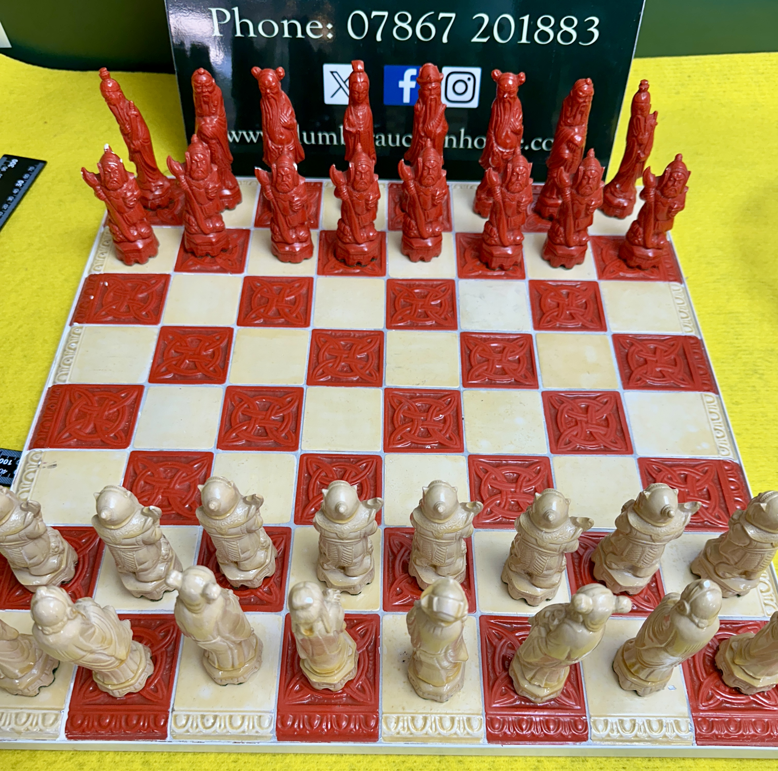 A Figural Chinese Imperial Style Chess Set with Matching Decorative Board