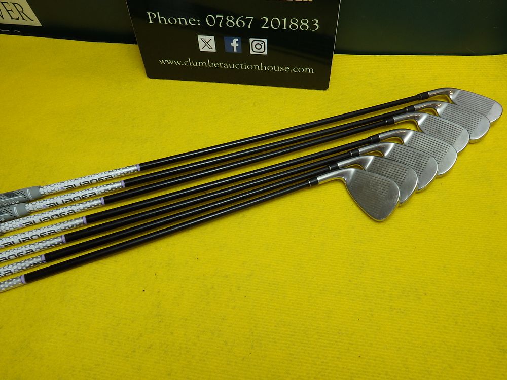 Lot 234: A Set of Seven TaylorMade Burner SuperFast Graphite-Shafted Golf Irons