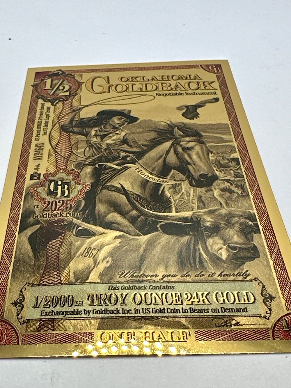 Lot 245: 2025 Oklahoma 1/2 Goldback 1/2000 Troy Ounce 24 Carat Gold Note