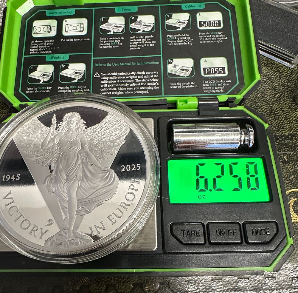 Lot 254: A Pair of World War II Anniversary Commemorative Silver Rounds