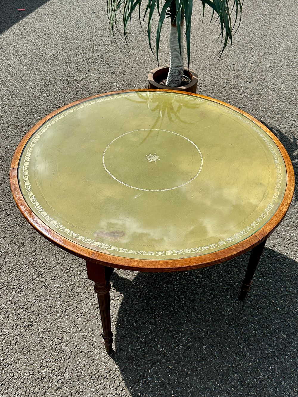 Lot 257: A Regency style mahogany and green leather inset nest of five tables