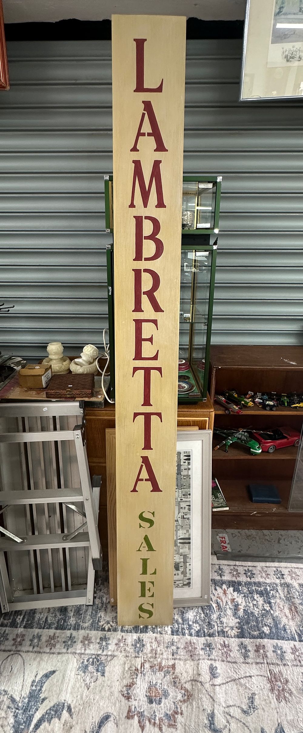 Lot 269: Large Vertical Hand Painted Wooden Lambretta Sales Advertising Sign
