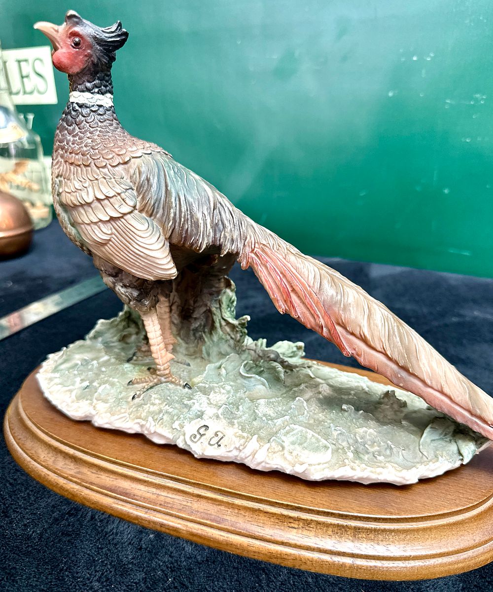 Lot 31: A Hand-Painted Pheasant Figurine on a Polished Base