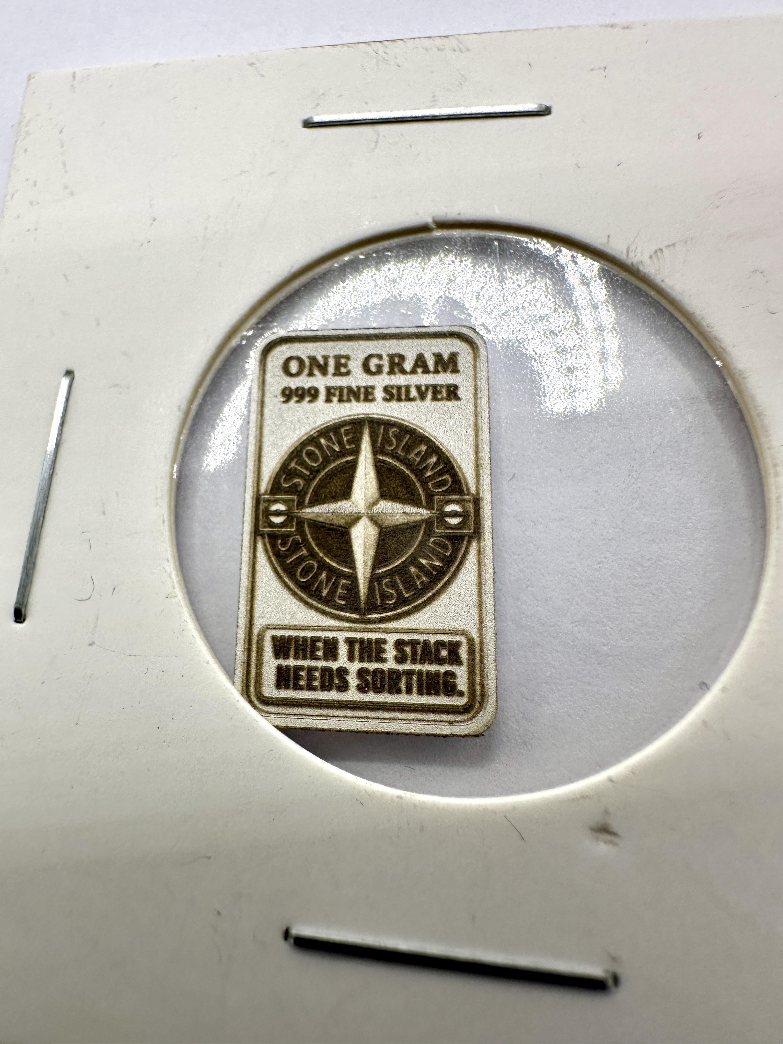 A Contemporary Stone Island .999 Fine Silver One Gram Bullion Bar