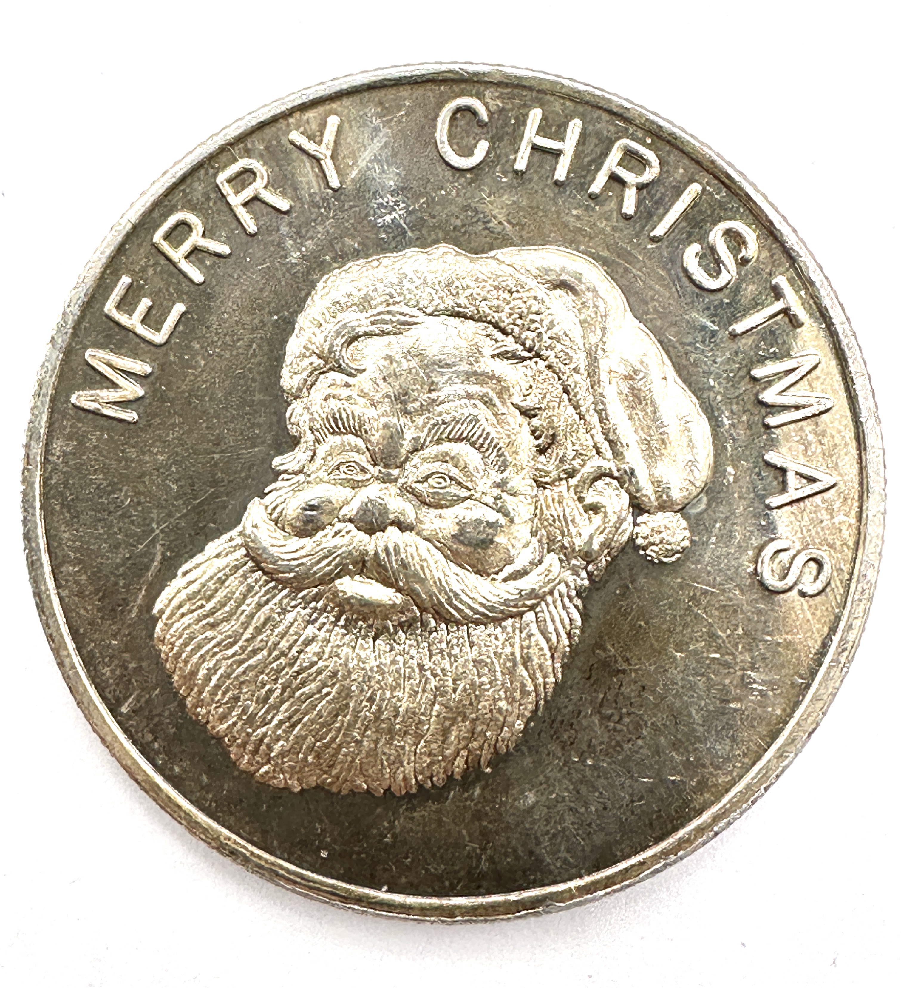 A .999 Silver Holiday Round, Santa Claus and Snowmen