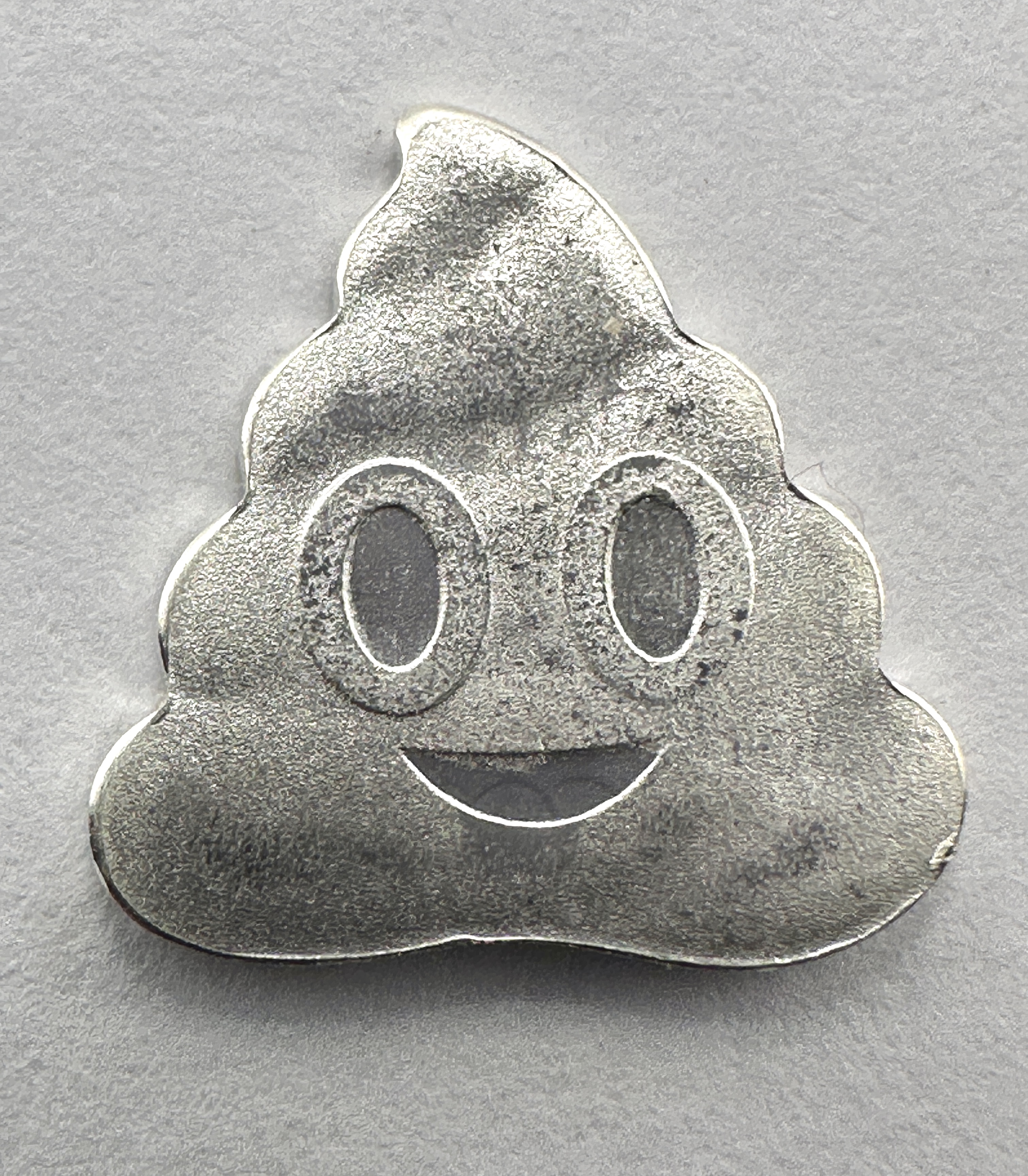A .999 Silver 1 Gram Poop Emoji Novelty Piece