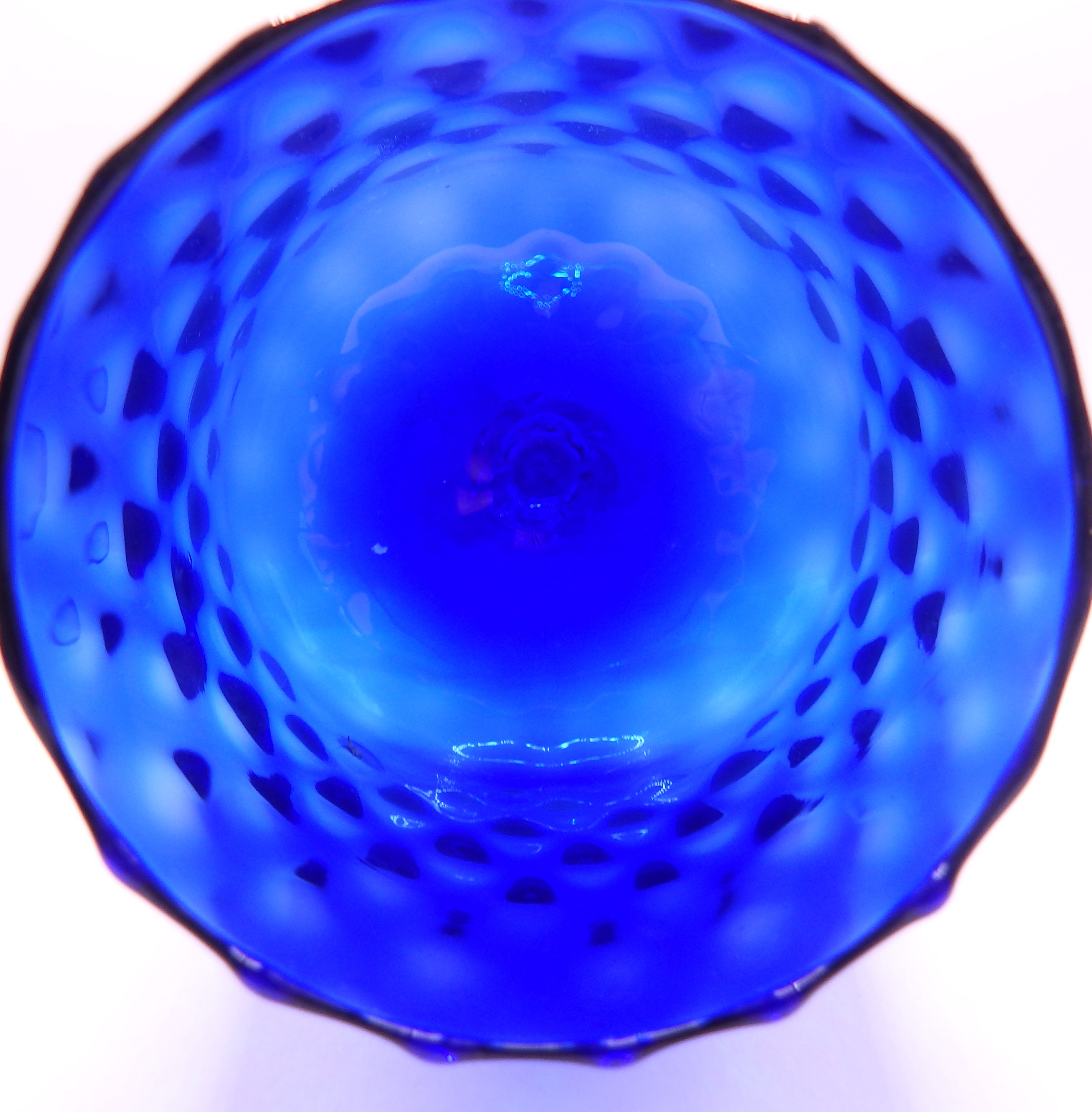 A Cobalt Blue Bowl with Honeycomb Patterning and Scalloped Rim