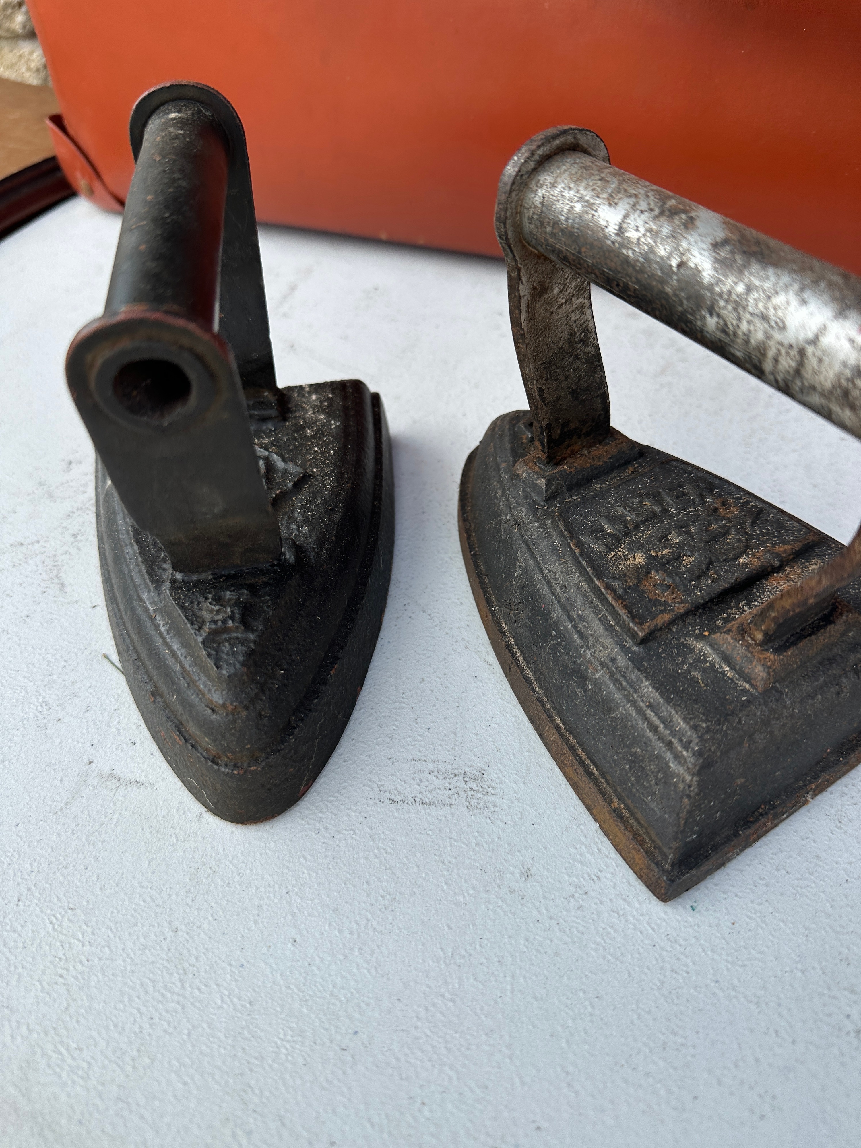 A Pair of Metal Sad Irons, One Marked DEPENDABLE NO 4