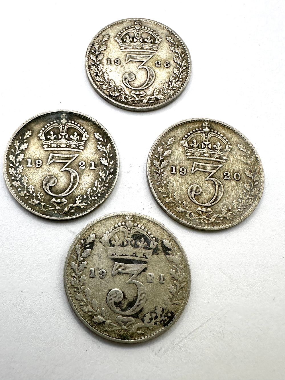 Lot 98: Four UK George V Silver Threepence Coins, 1920-1926