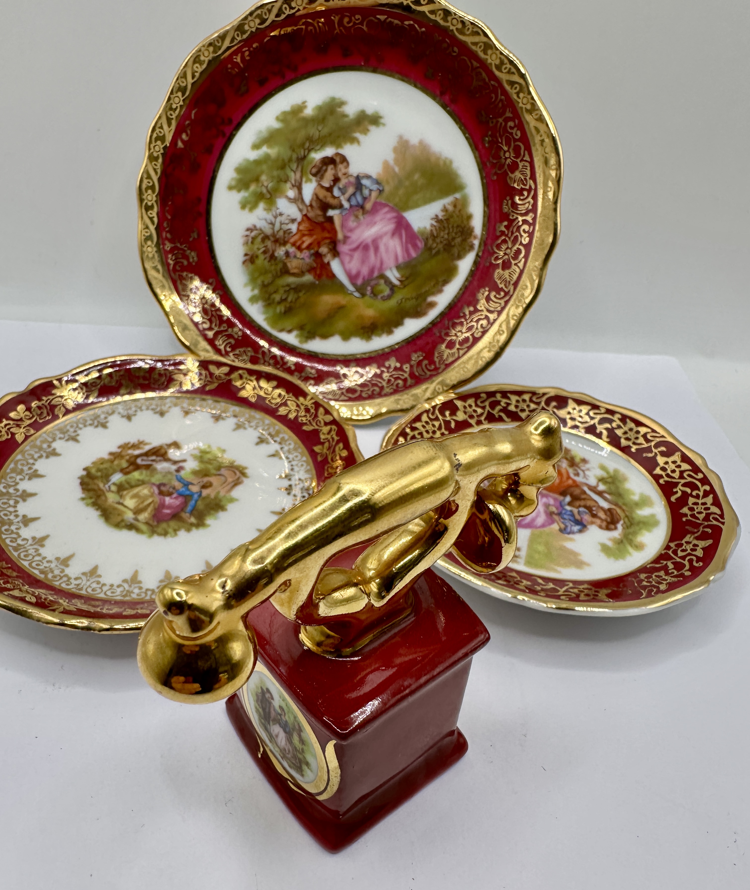 A French La Reine Limoges Porcelain Collection featuring Courting Scenes