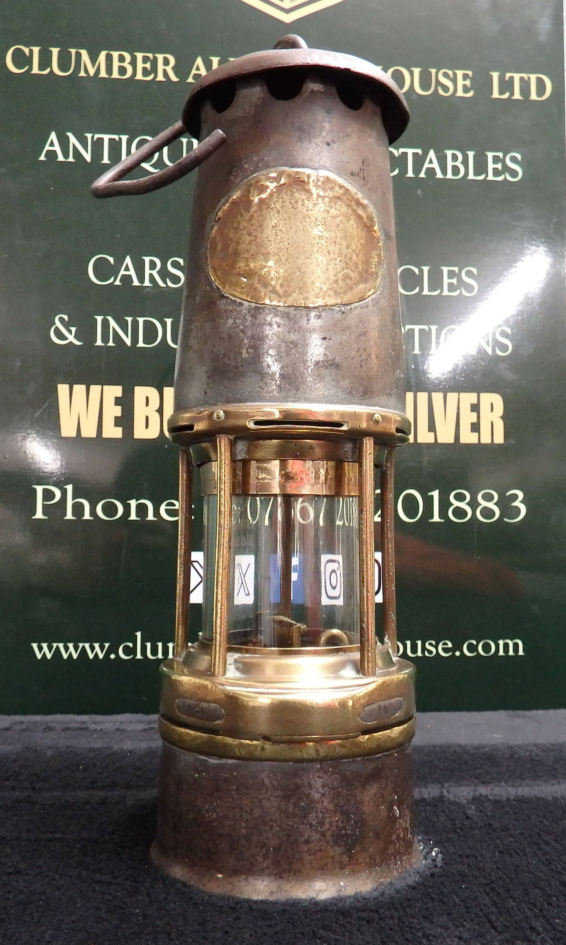 A British Brass and Steel Miner's Flame Safety Lamp, Numbered 129