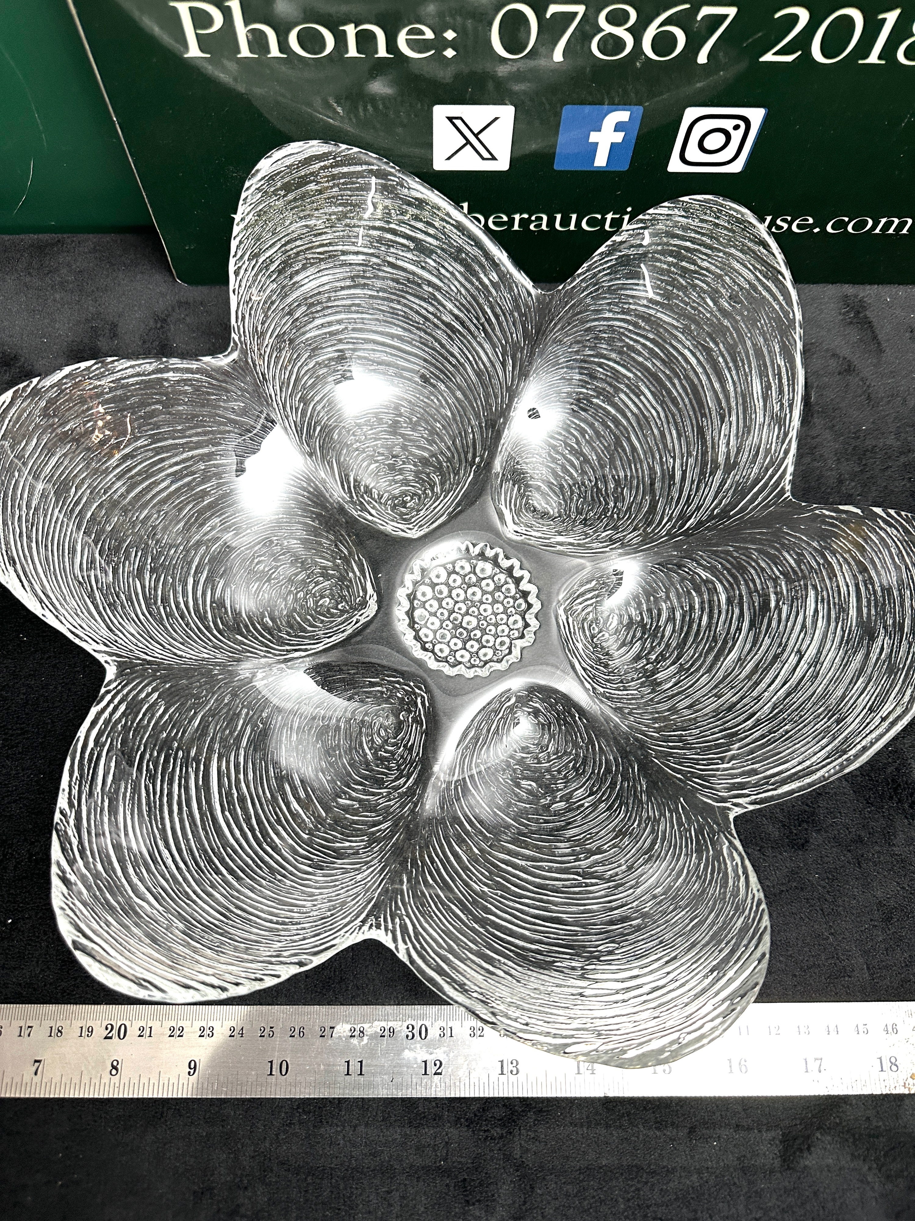 A Large Clear Glass Bowl, of six-lobed shell form