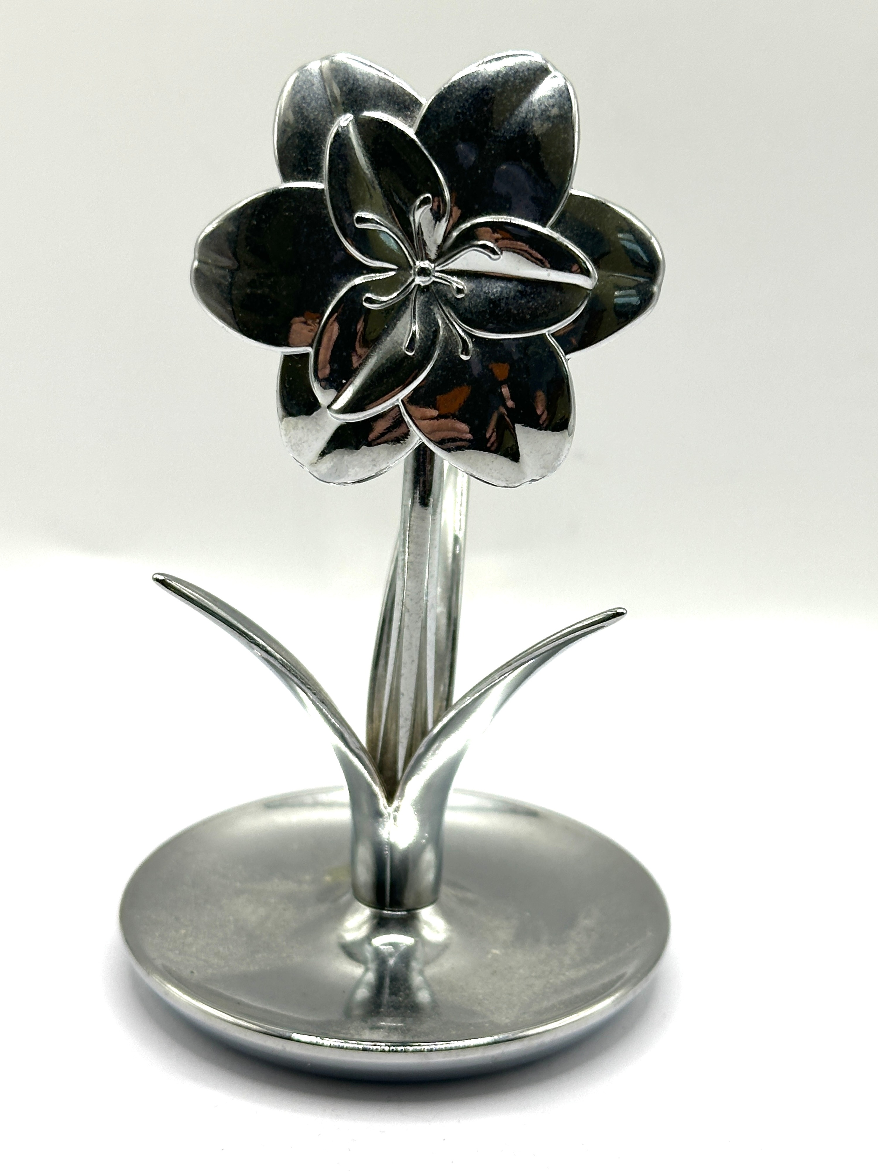 A Contemporary white metal Flower Pedestal Ornament