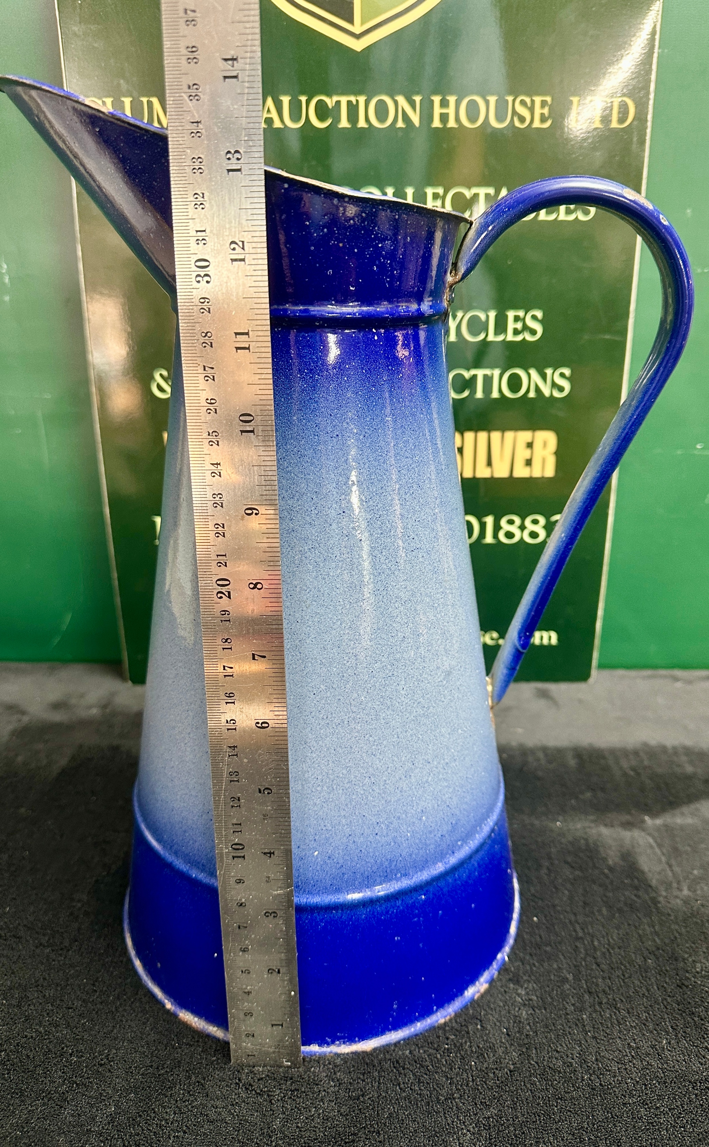 A Mid-20th Century Large Enamelled Metal Blue Gradient Pitcher