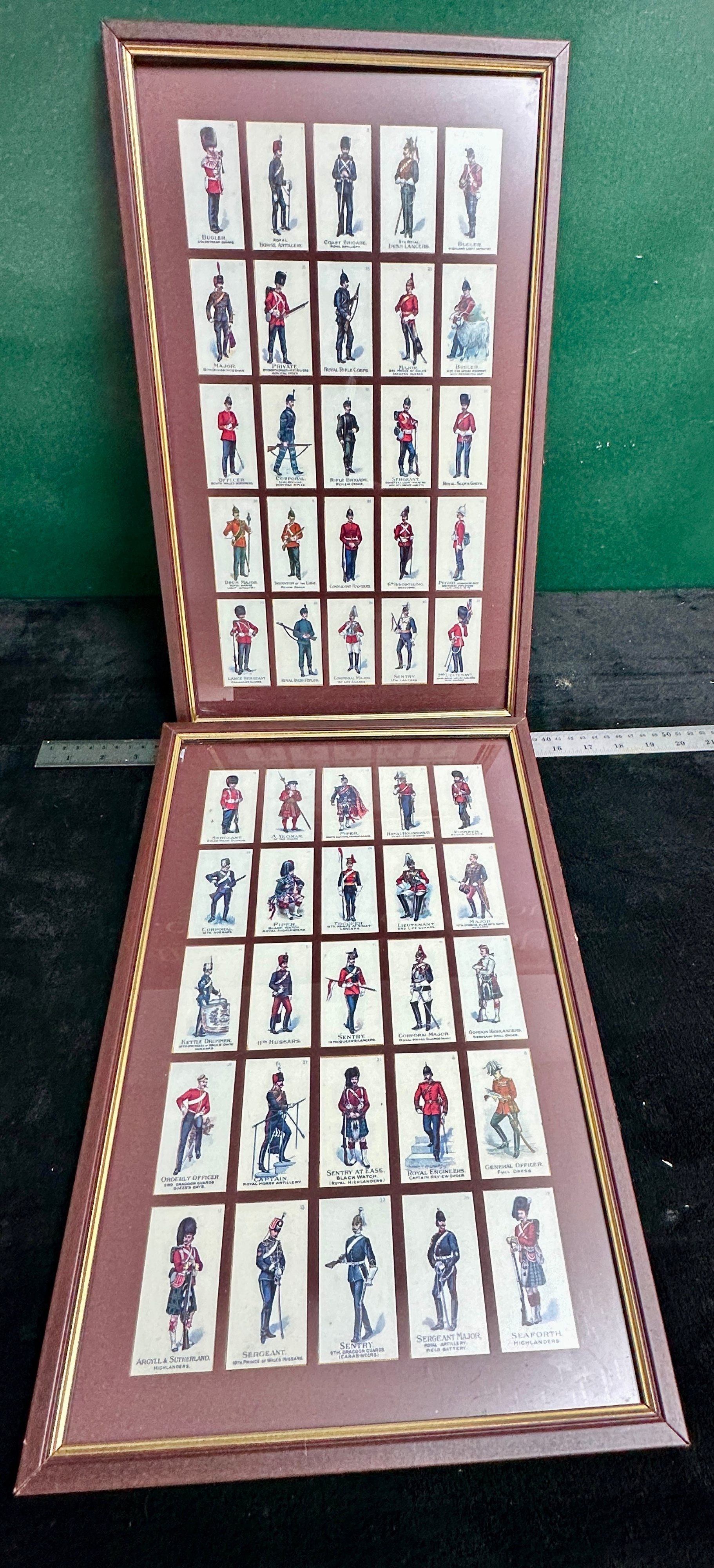 A Pair of Framed Sets of John Player and Sons Military Series Cigarette Cards