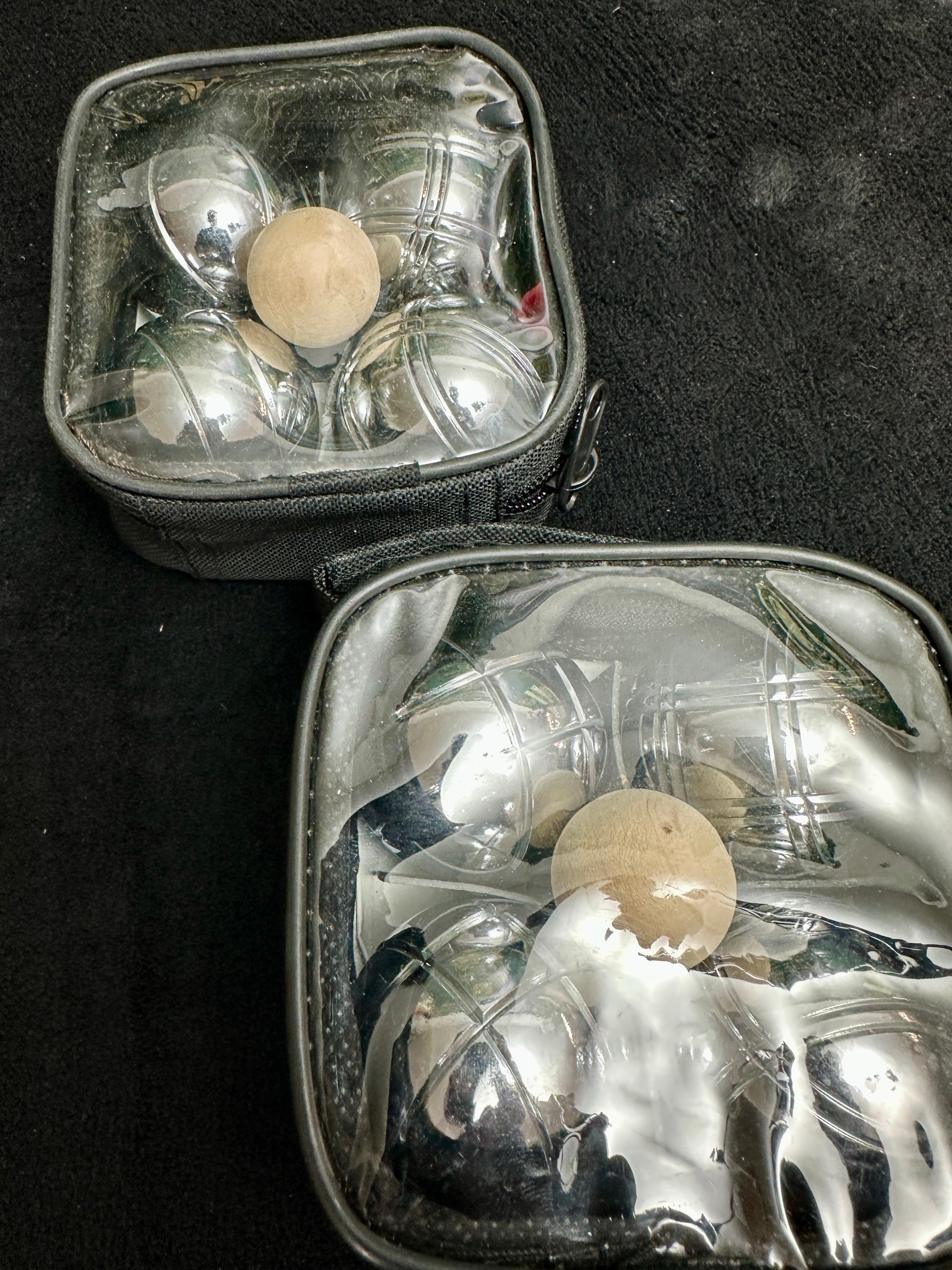 Two Metal Boules Sets each with Four Balls and a Jack