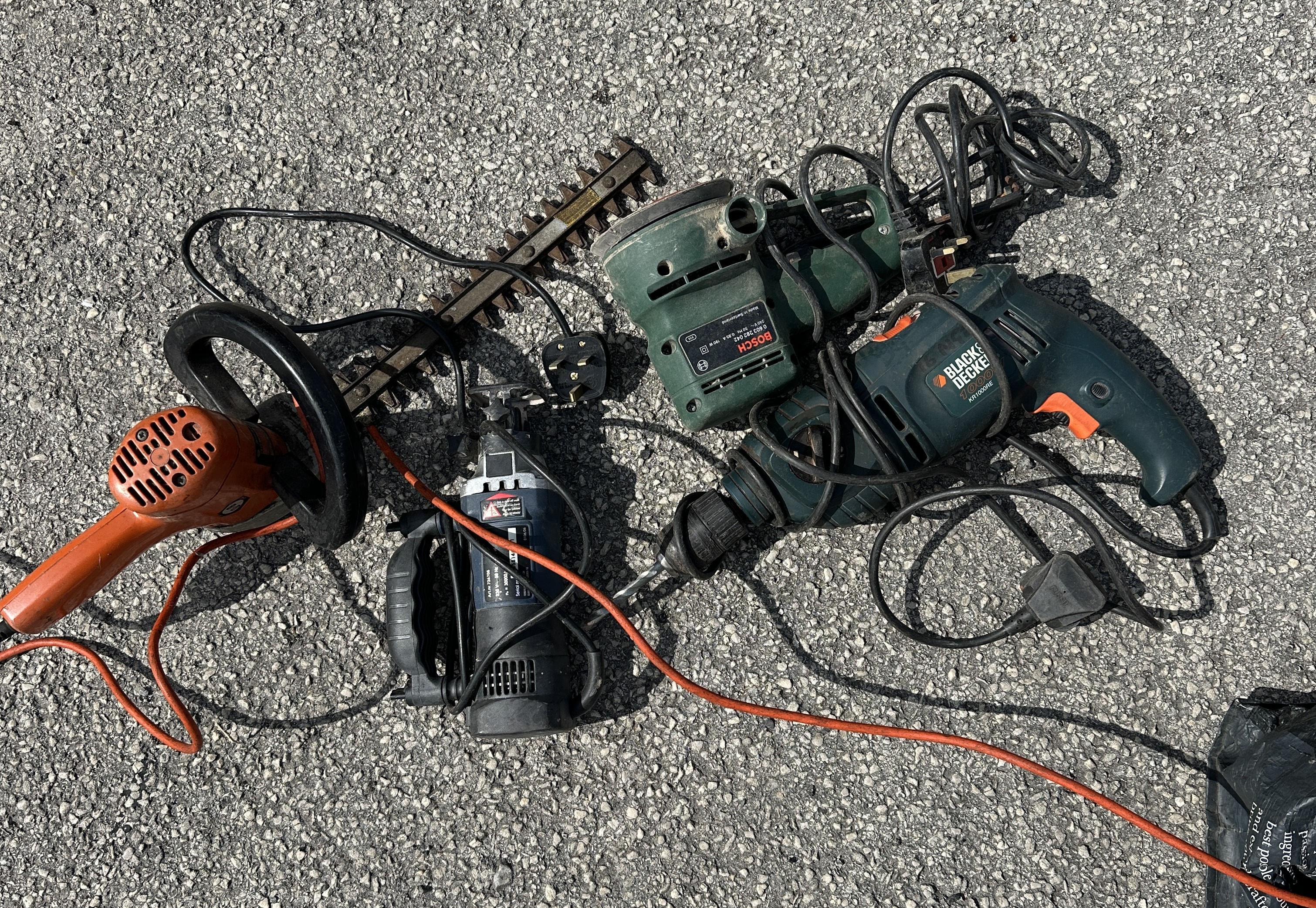 A Group of Bosch and Black & Decker Corded Power Tools