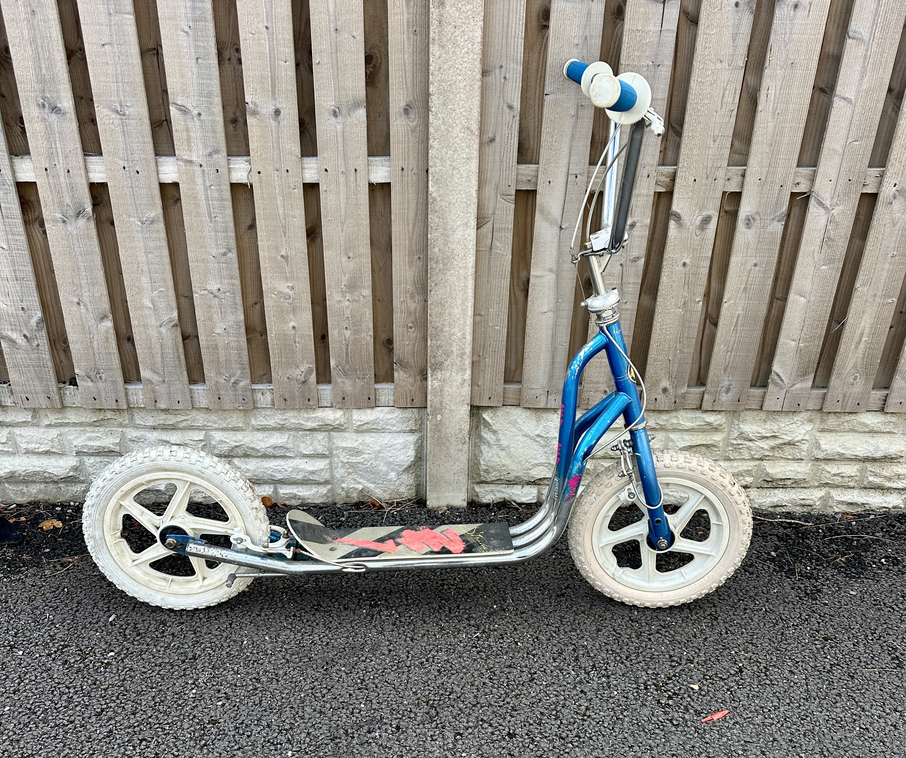 A Vintage Vampire BMX Style Kick Scooter with White Wheels