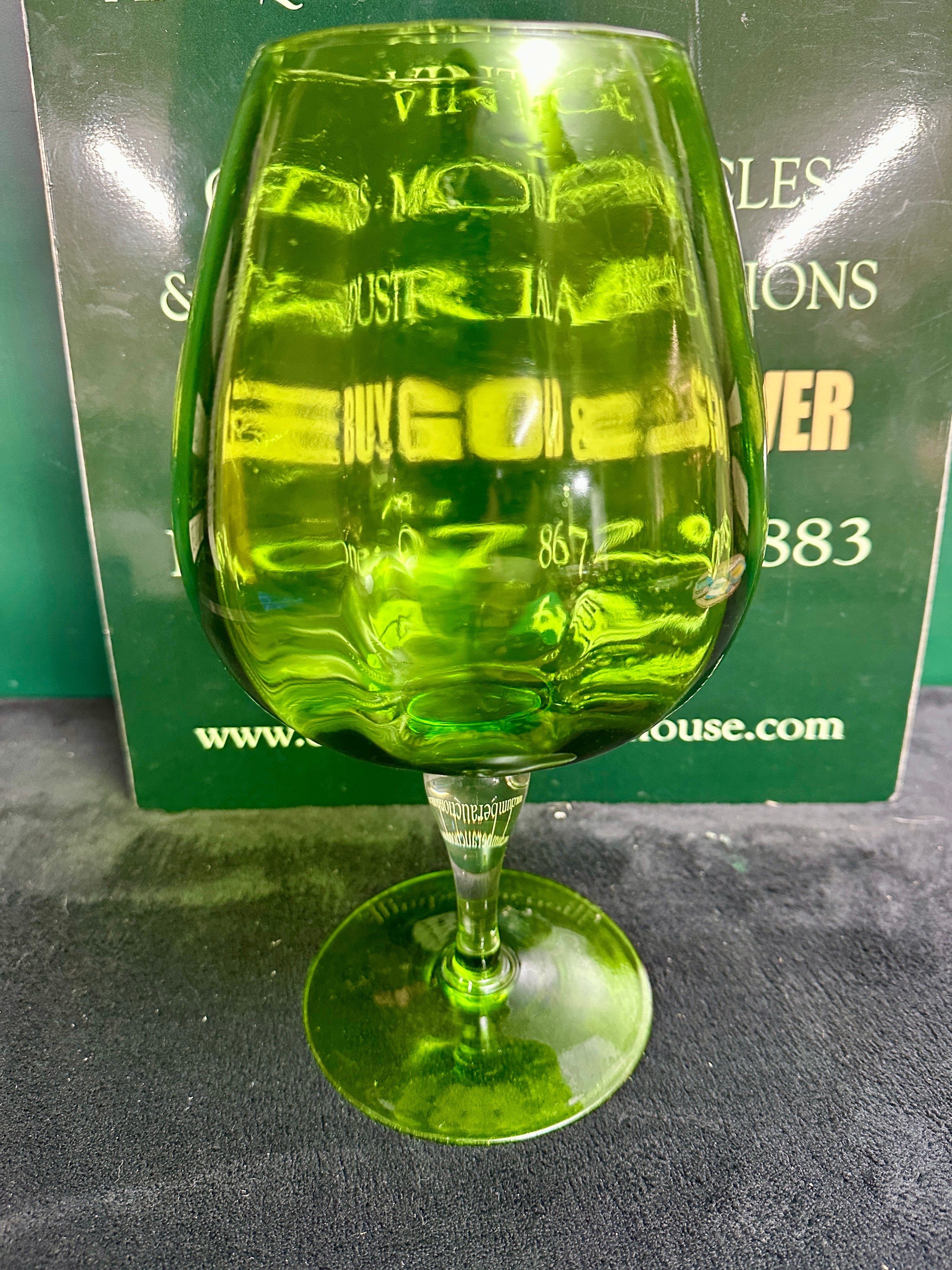 A Large Green Glass Brandy Balloon with Moulded Optic Bowl