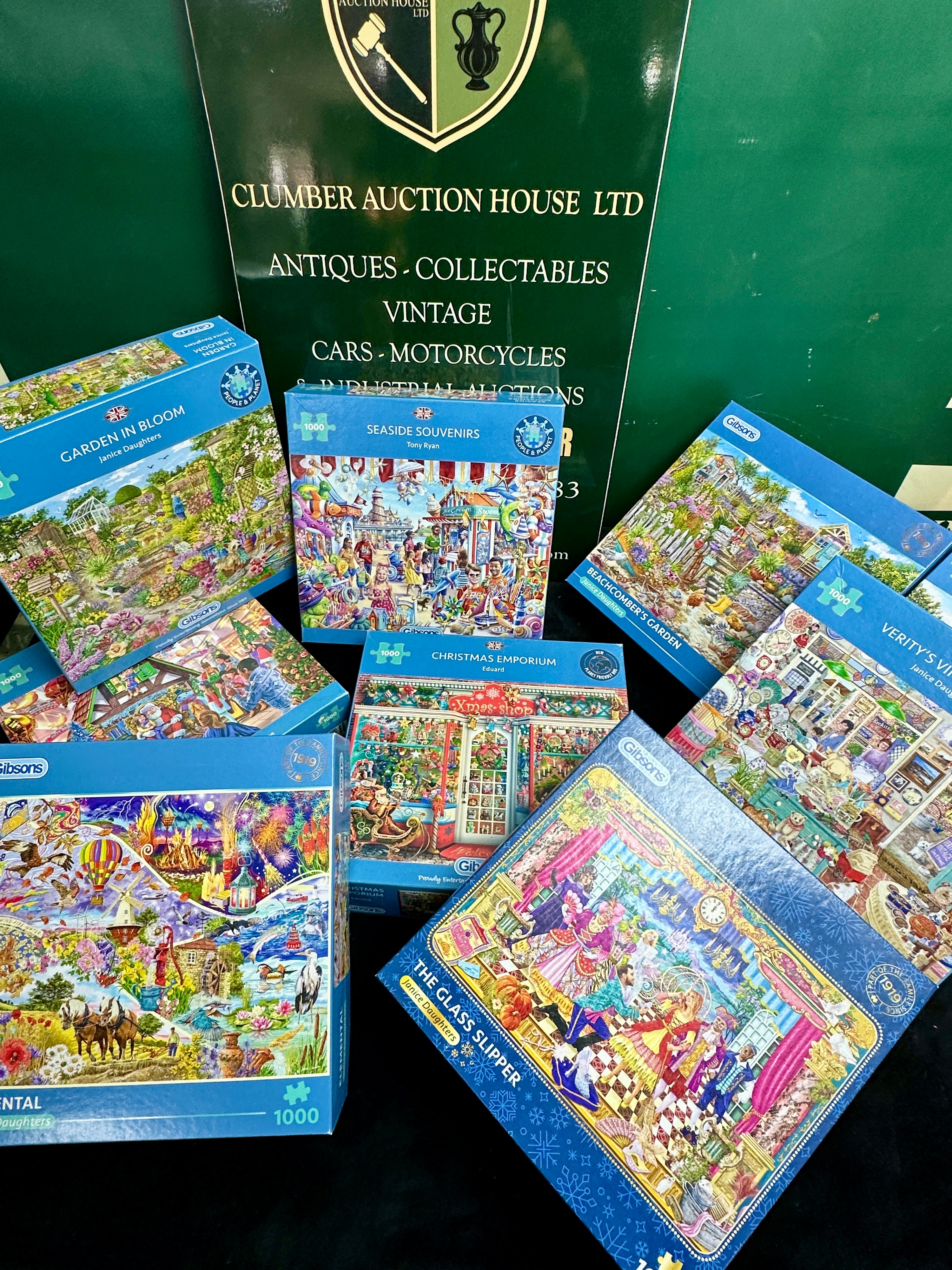 A Collection of Seven Gibsons 1000-Piece Jigsaw Puzzles