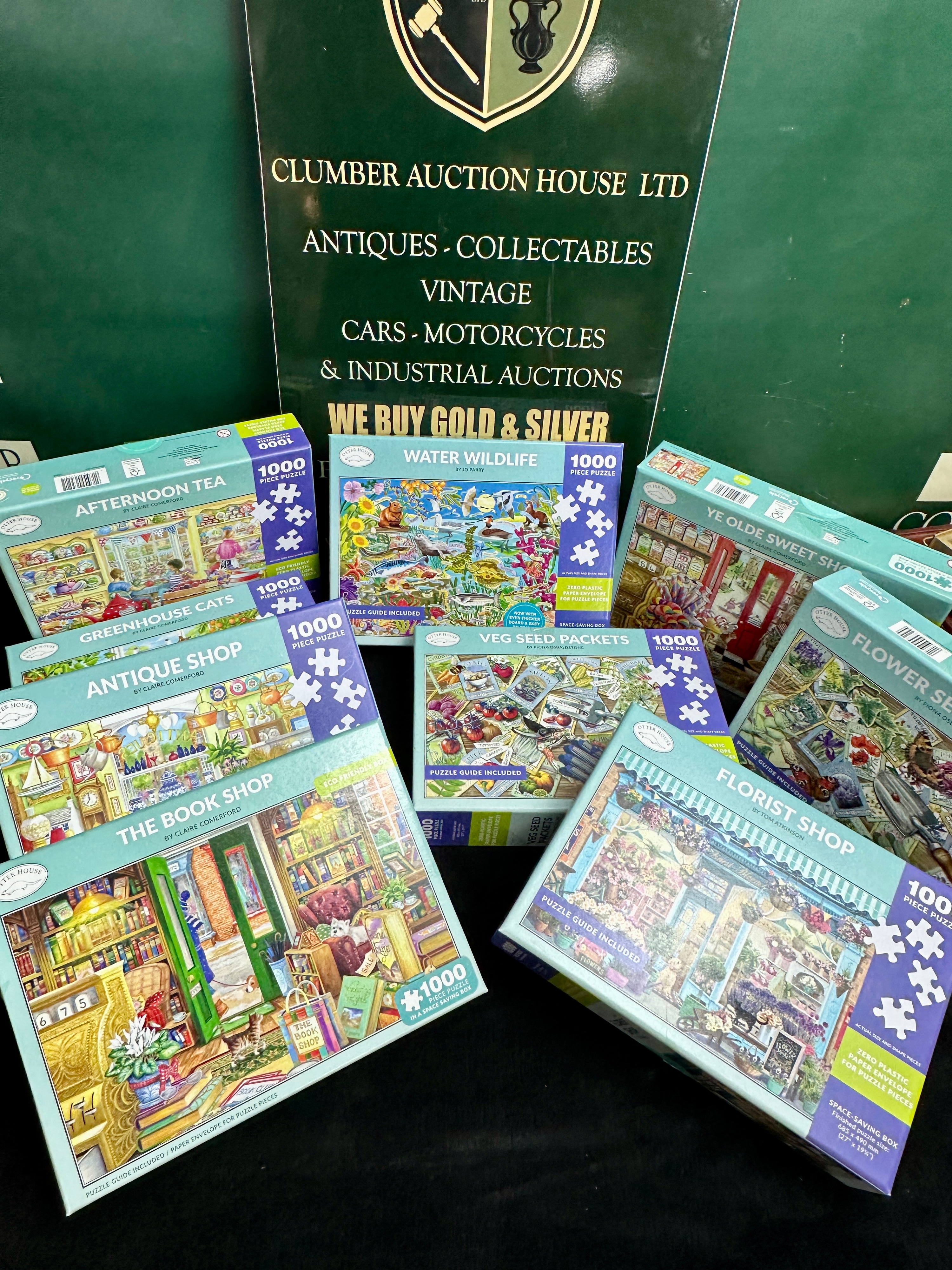 A Collection of Nine Otter House 1000-Piece Jigsaw Puzzles