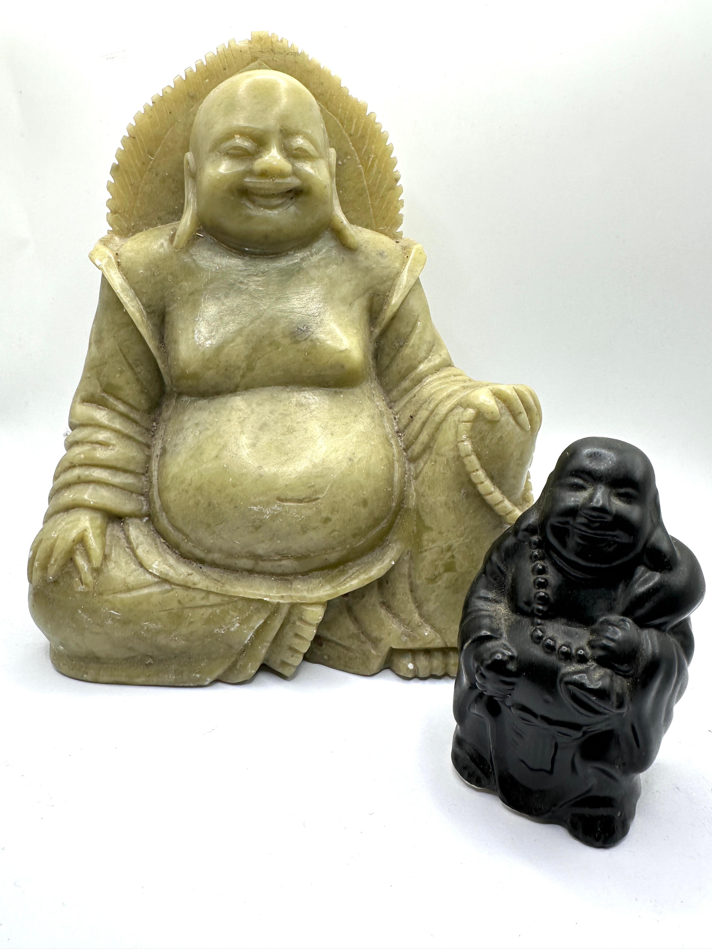Two Hotei Figurines Including a Carved Soapstone Example
