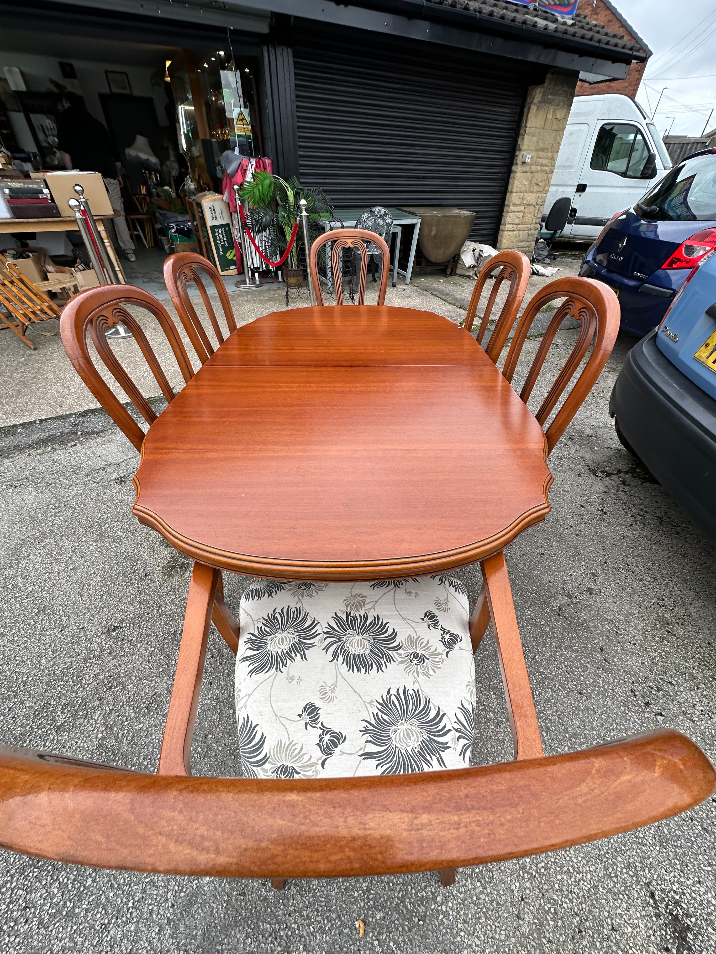 A Late 20th Century Extending Dining Table and Six Chairs