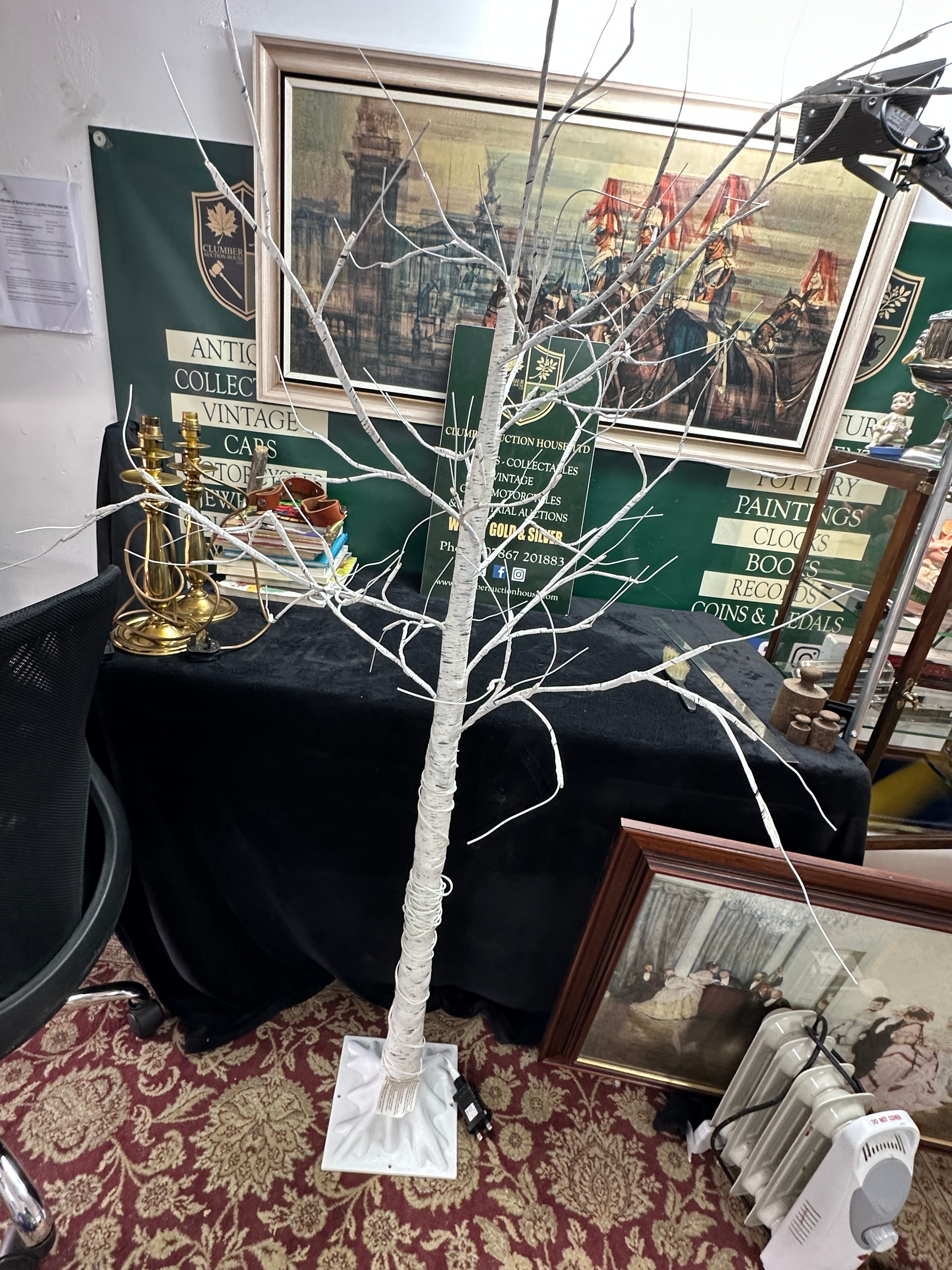 A Decorative LED Lighted Tree with Posable Branches