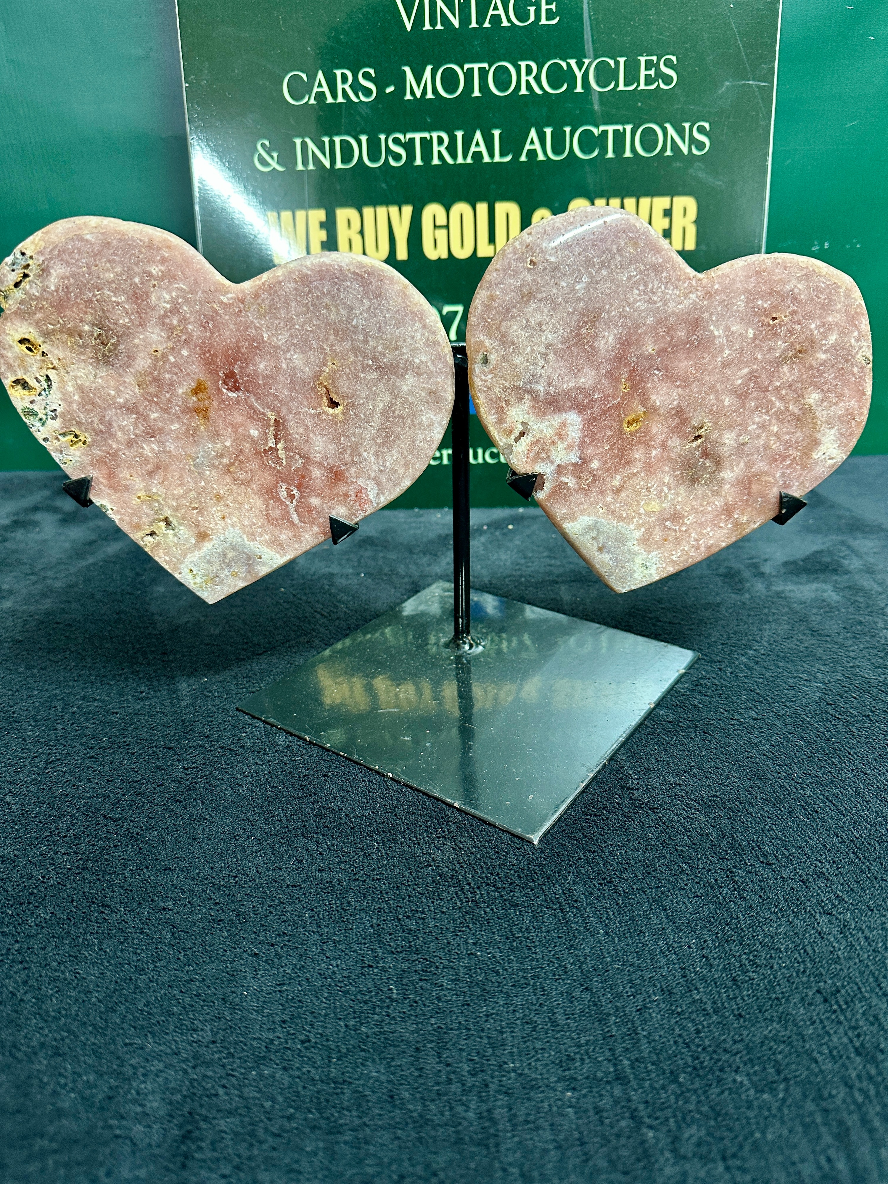 A Pair of Pink Amethyst Heart Slabs, Polished on a Metal Stand