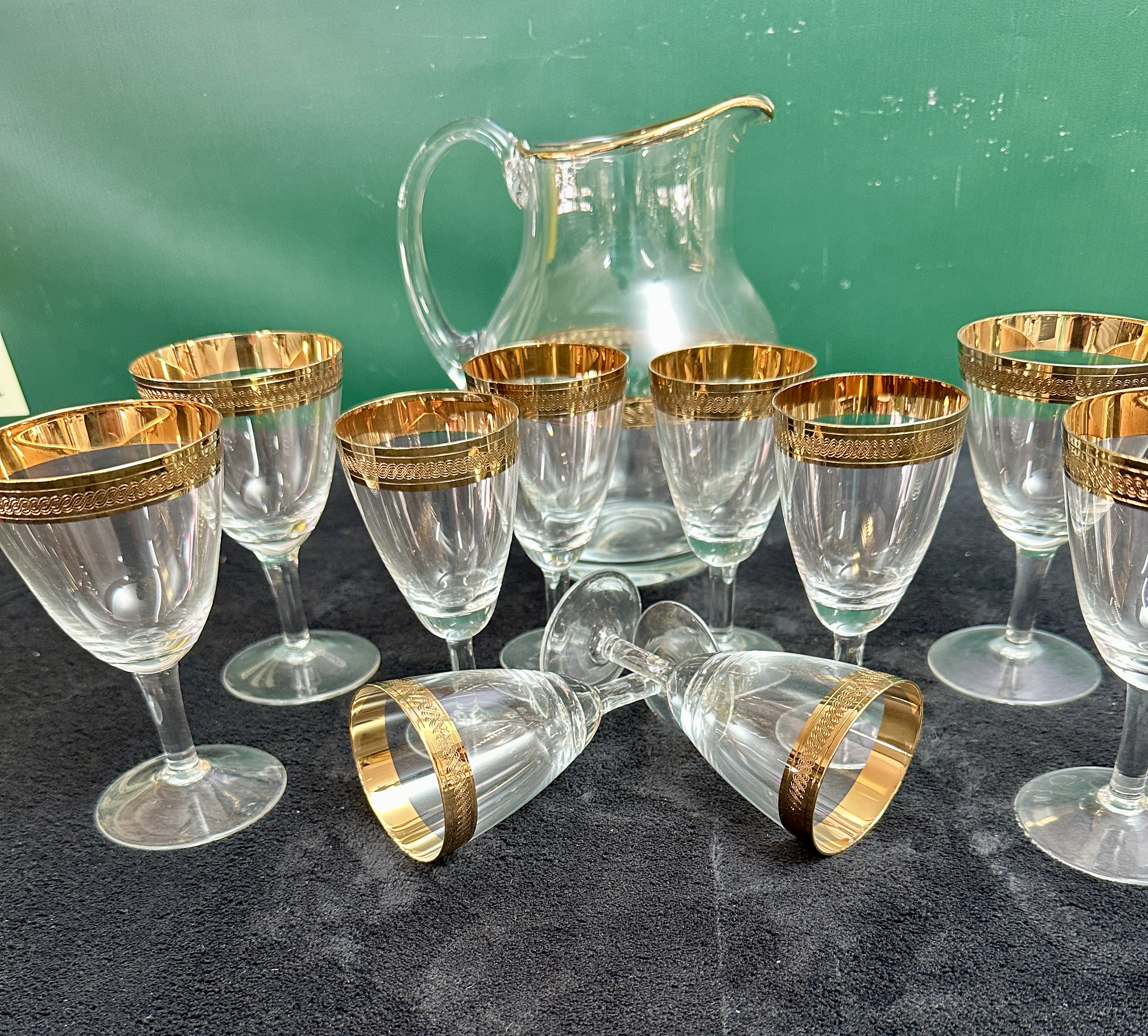 A Pitcher and Ten Stemmed Glasses, with acid-etched rims