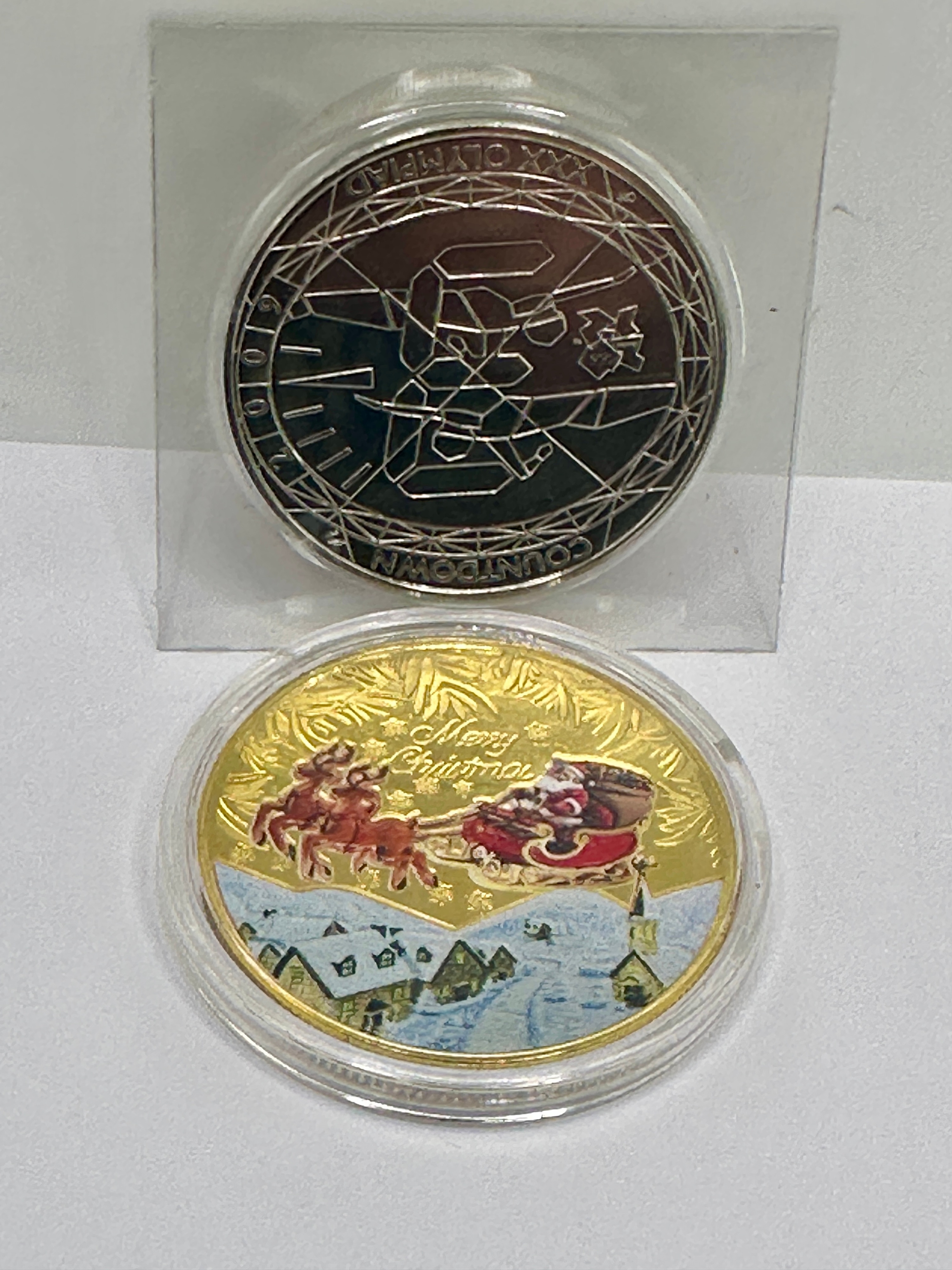 Two UK Numismatic Items, 2010 Five Pounds Coin and Metal Medal
