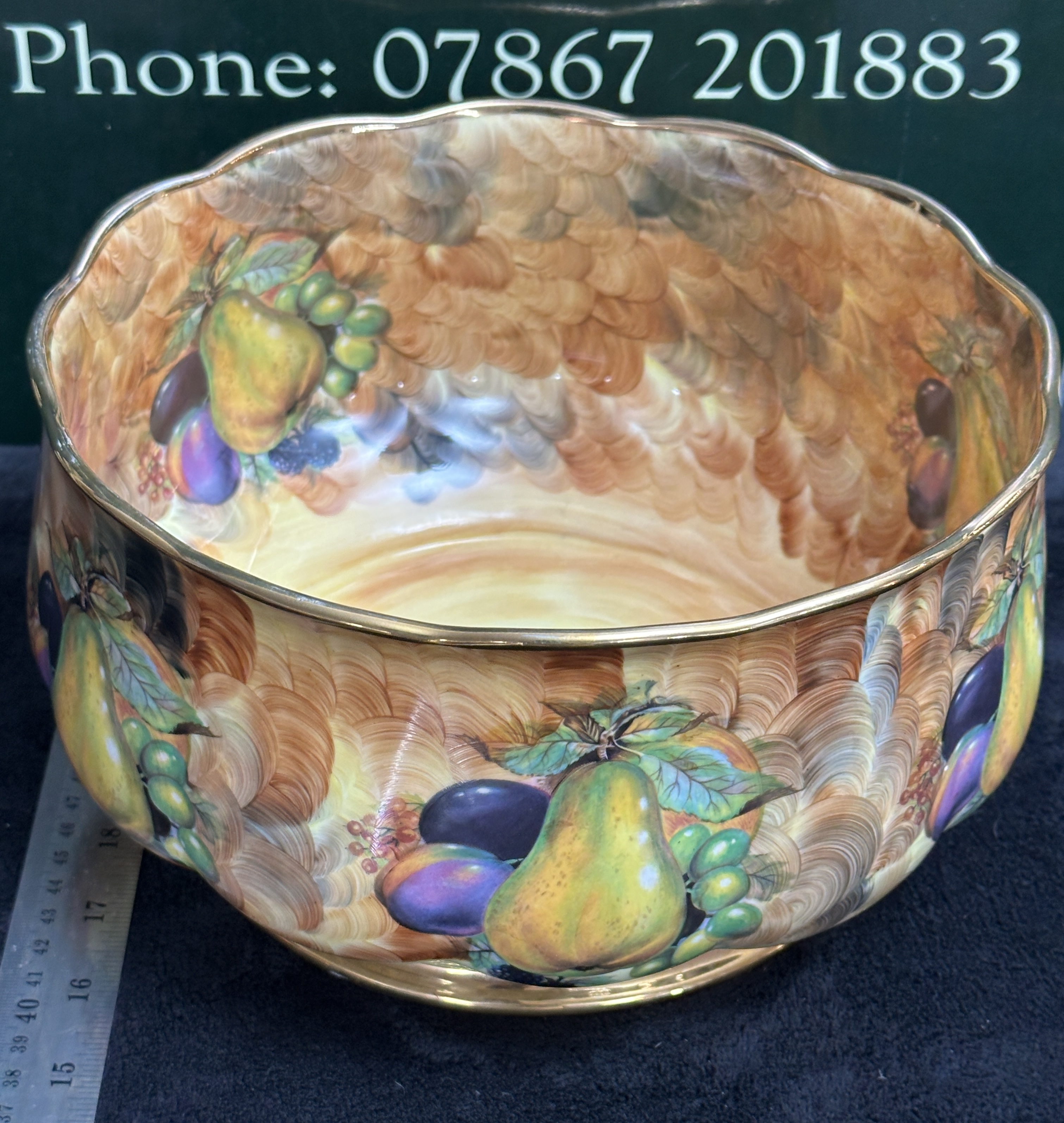 A Fruit Bowl with Scalloped Rim and Hand-Painted Orchard Decoration