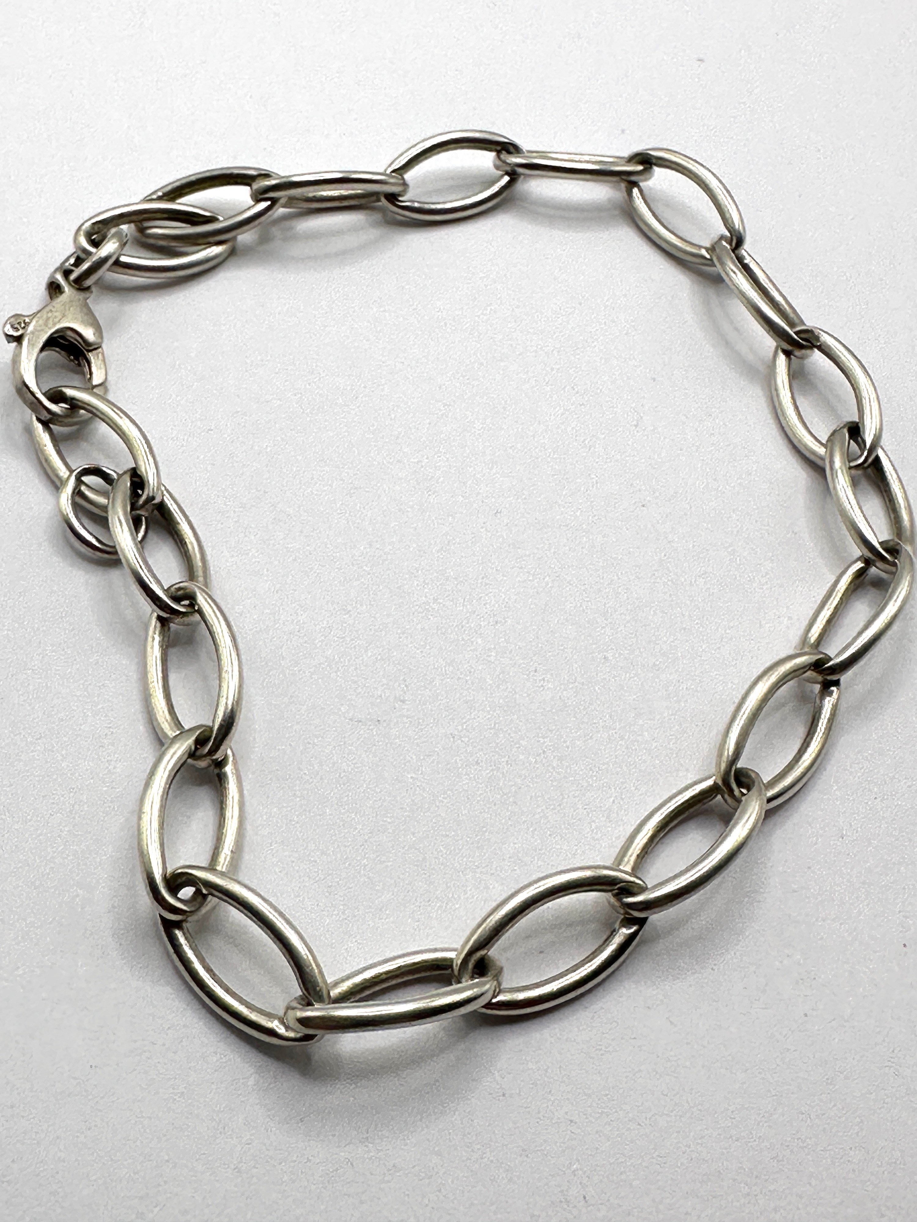 A 925 Silver Bracelet, featuring elongated oval links
