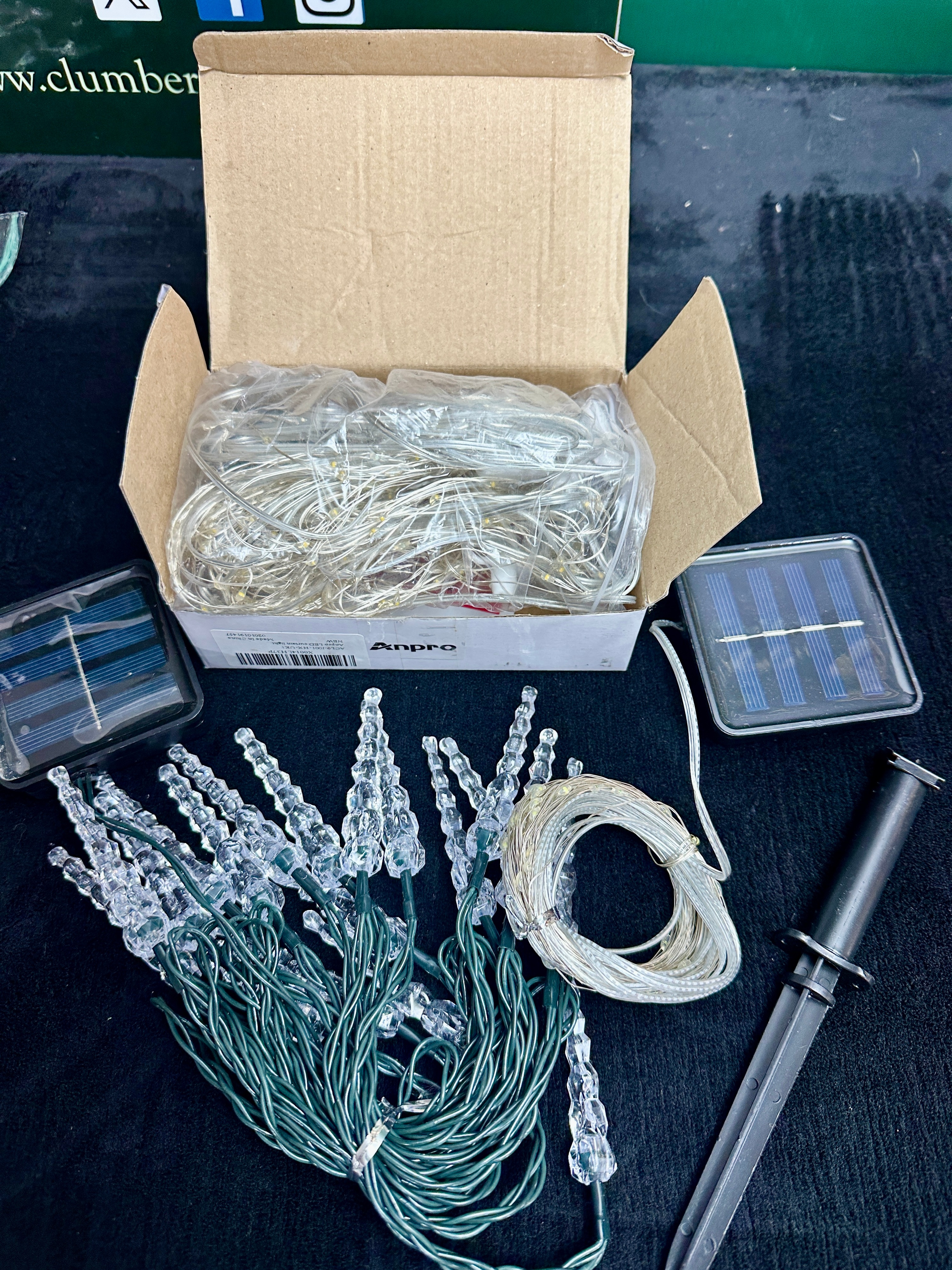 An Assortment of Solar-Powered LED Decorative String Lights and Accessories