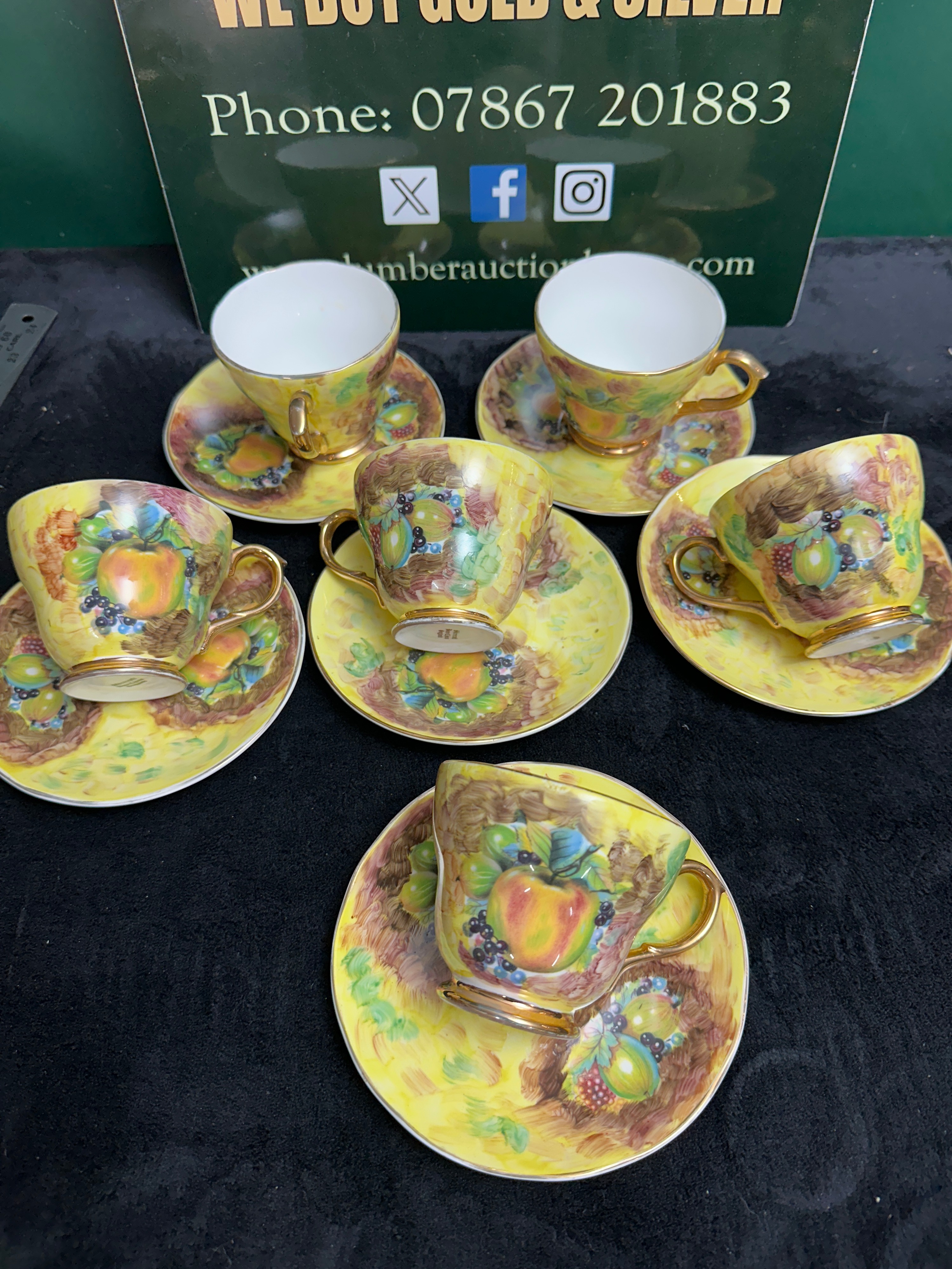 A Set of Six English Shirecraft Bone China Teacups and Saucers, painted fruit decoration