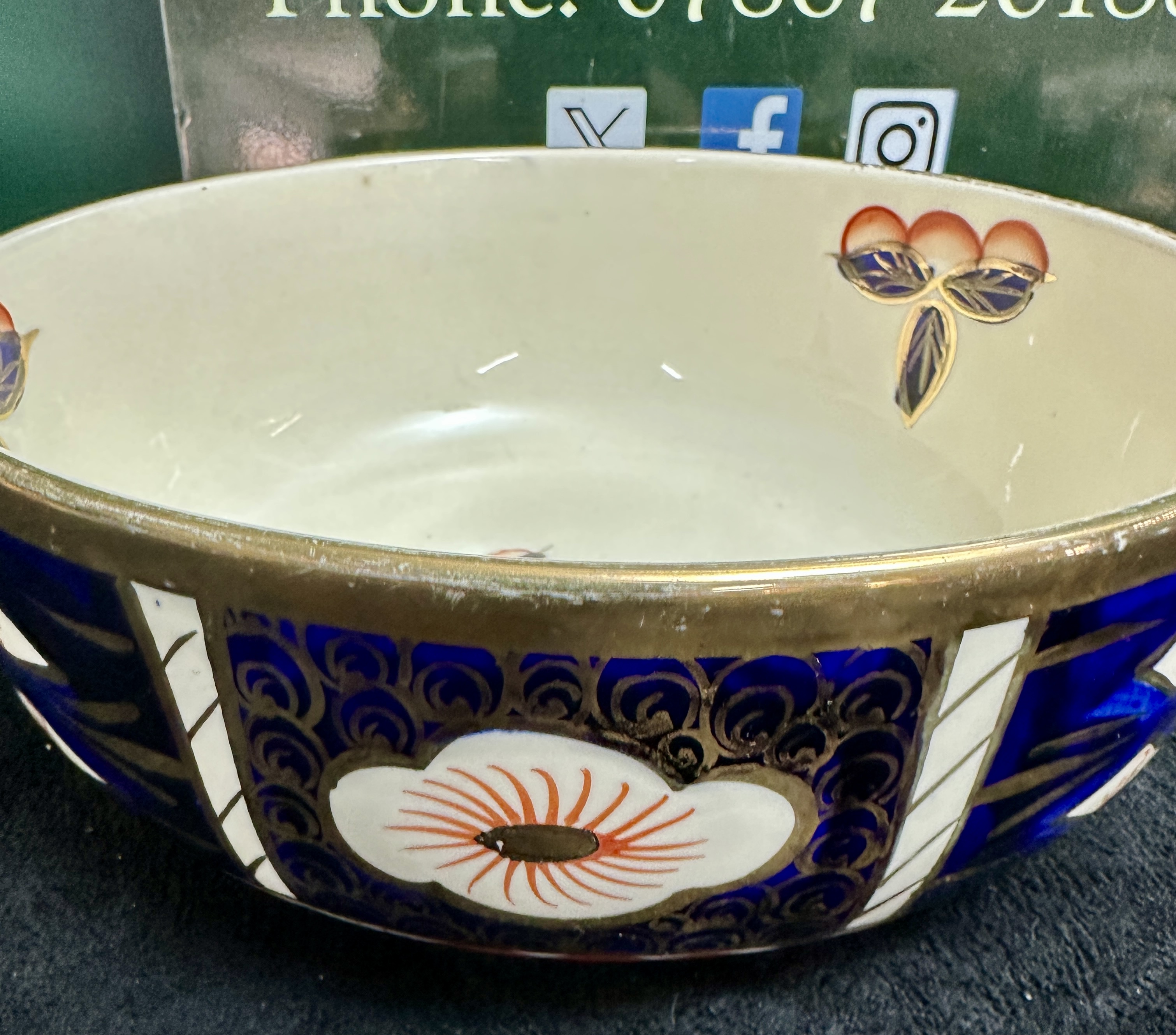 A Ceramic Serving Bowl Decorated in the Imari Palette