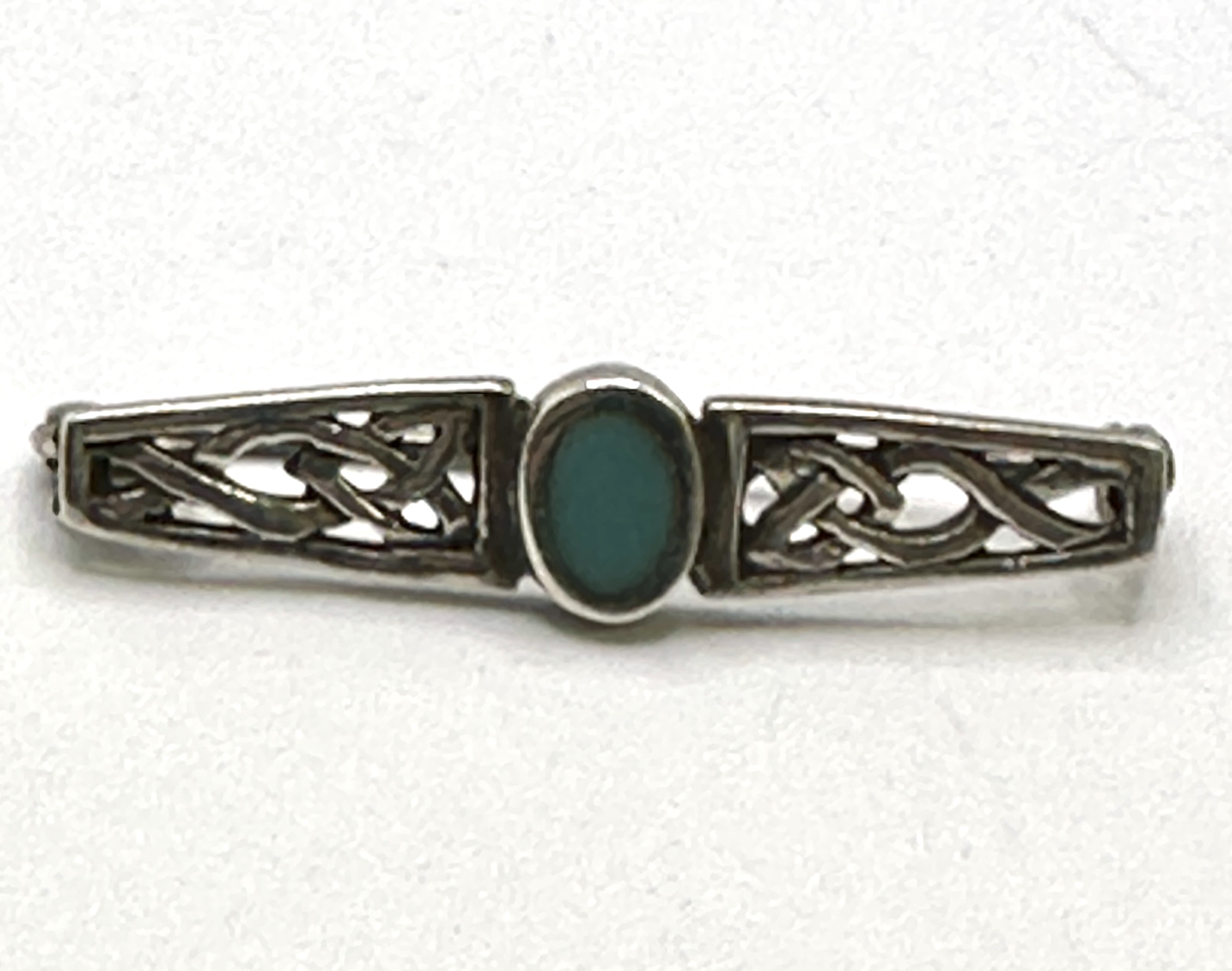 A 925 Sterling Silver Celtic Interlace Bar Brooch with Central Cabochon
