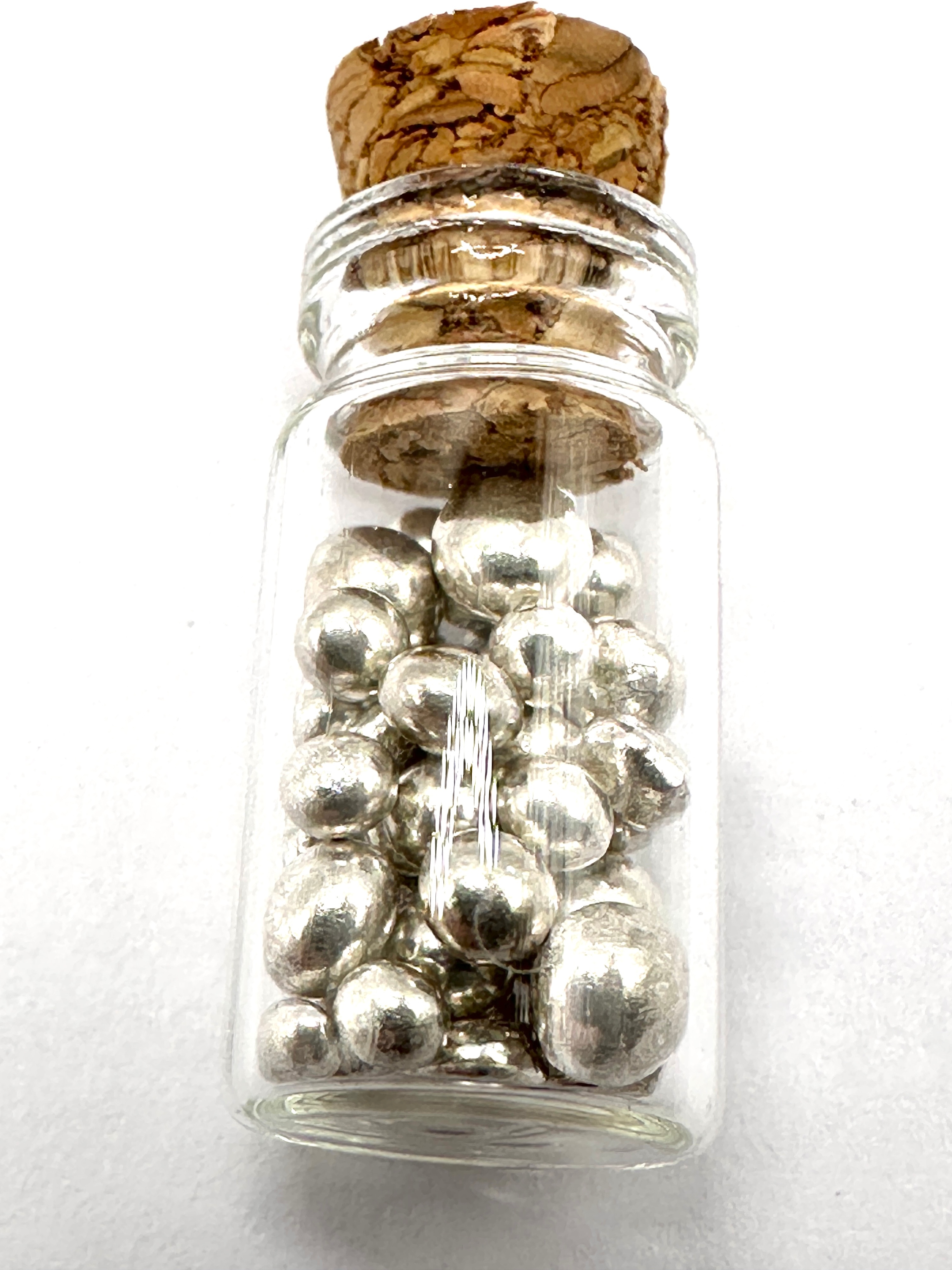 A 4 Gram Silver Grain Lot in Glass Vial