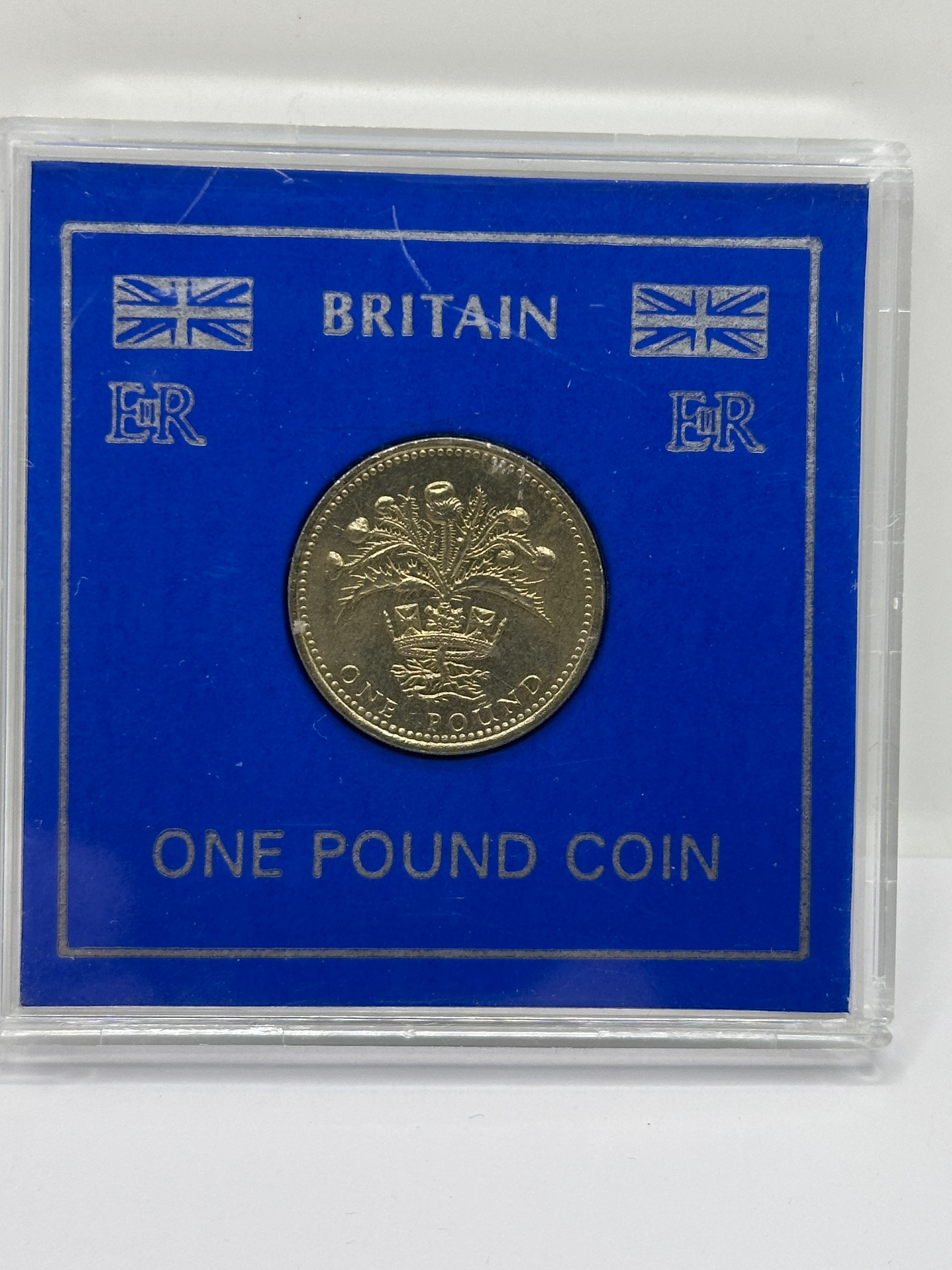 UK Elizabeth II One Pound Coin, in blue card mount
