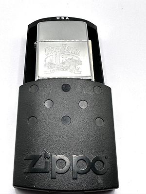 A 2004 Zippo Metal Lighter with New York Skyline Design