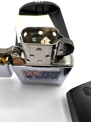 A USA Zippo Windproof Lighter with Australian Flag Emblem