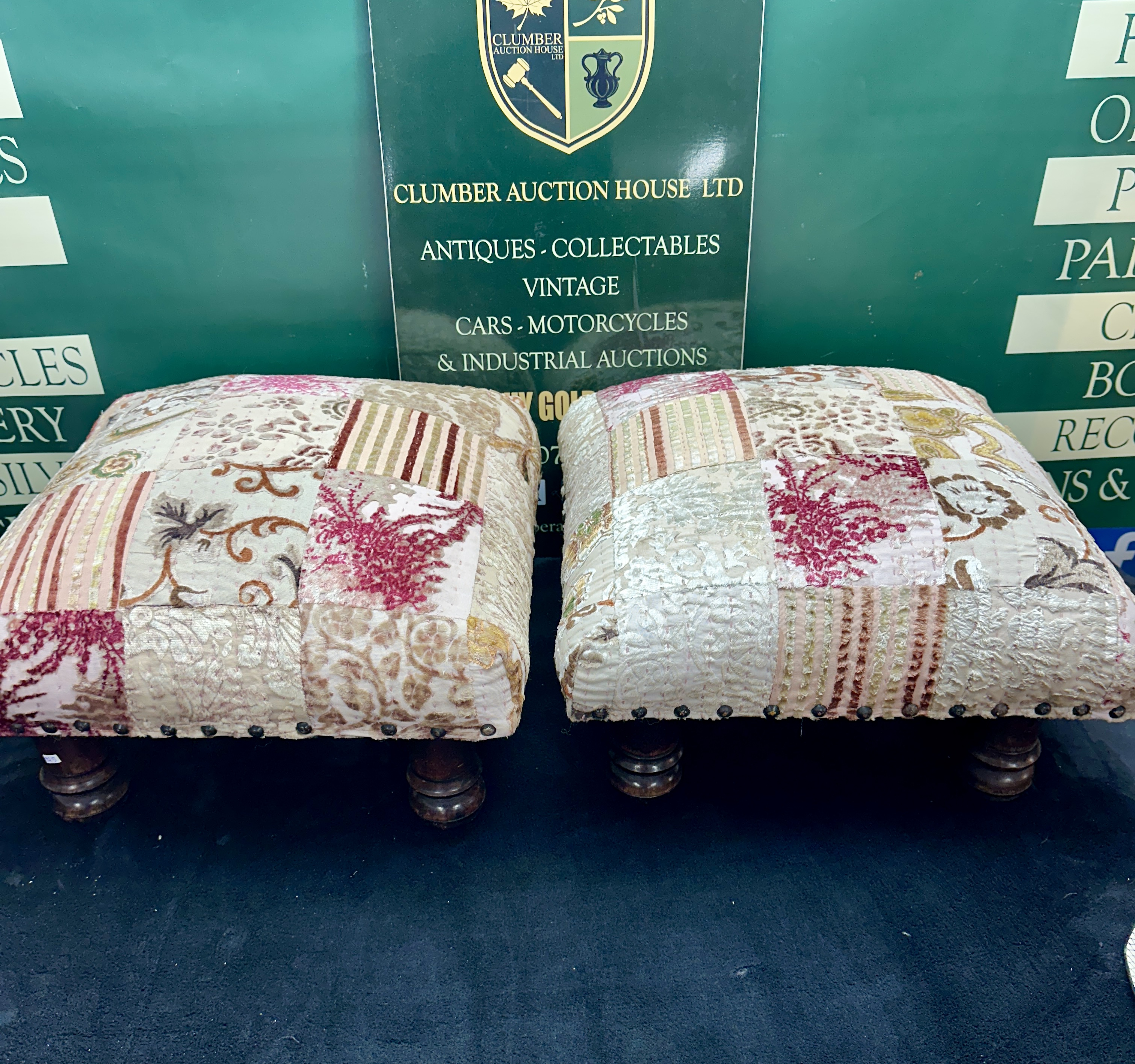 A Pair of Domed Patchwork Upholstered Footstools with Turned Wooden Feet