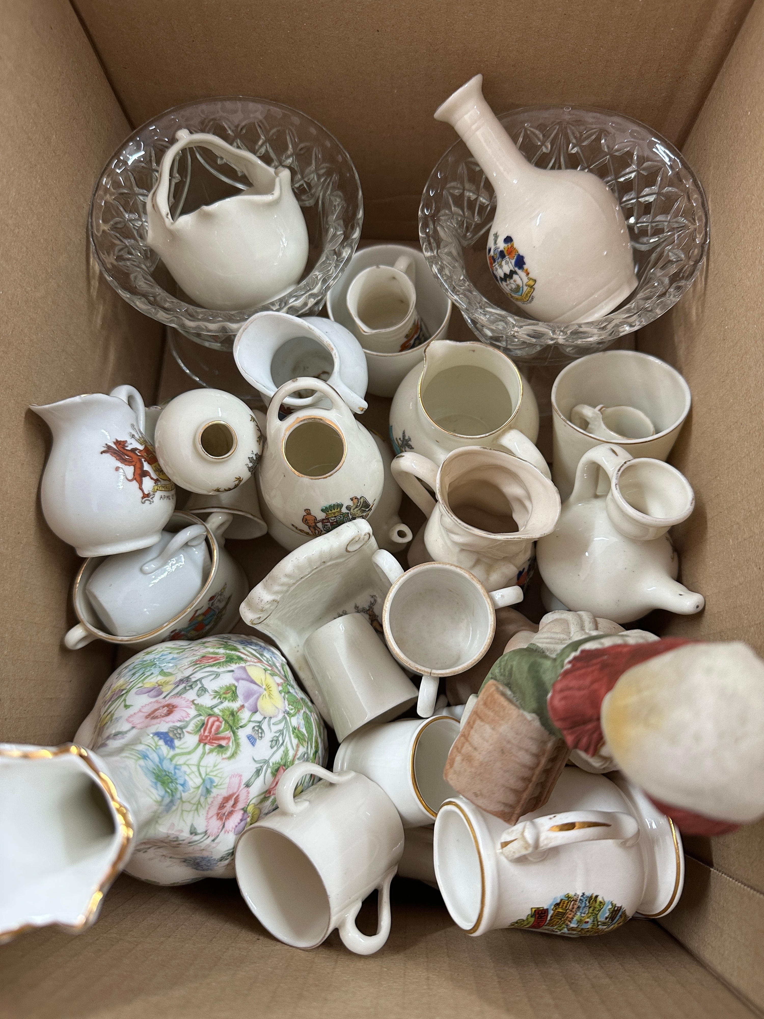 An Assortment of Miniature Glazed Ceramic Crested Souvenir Ware