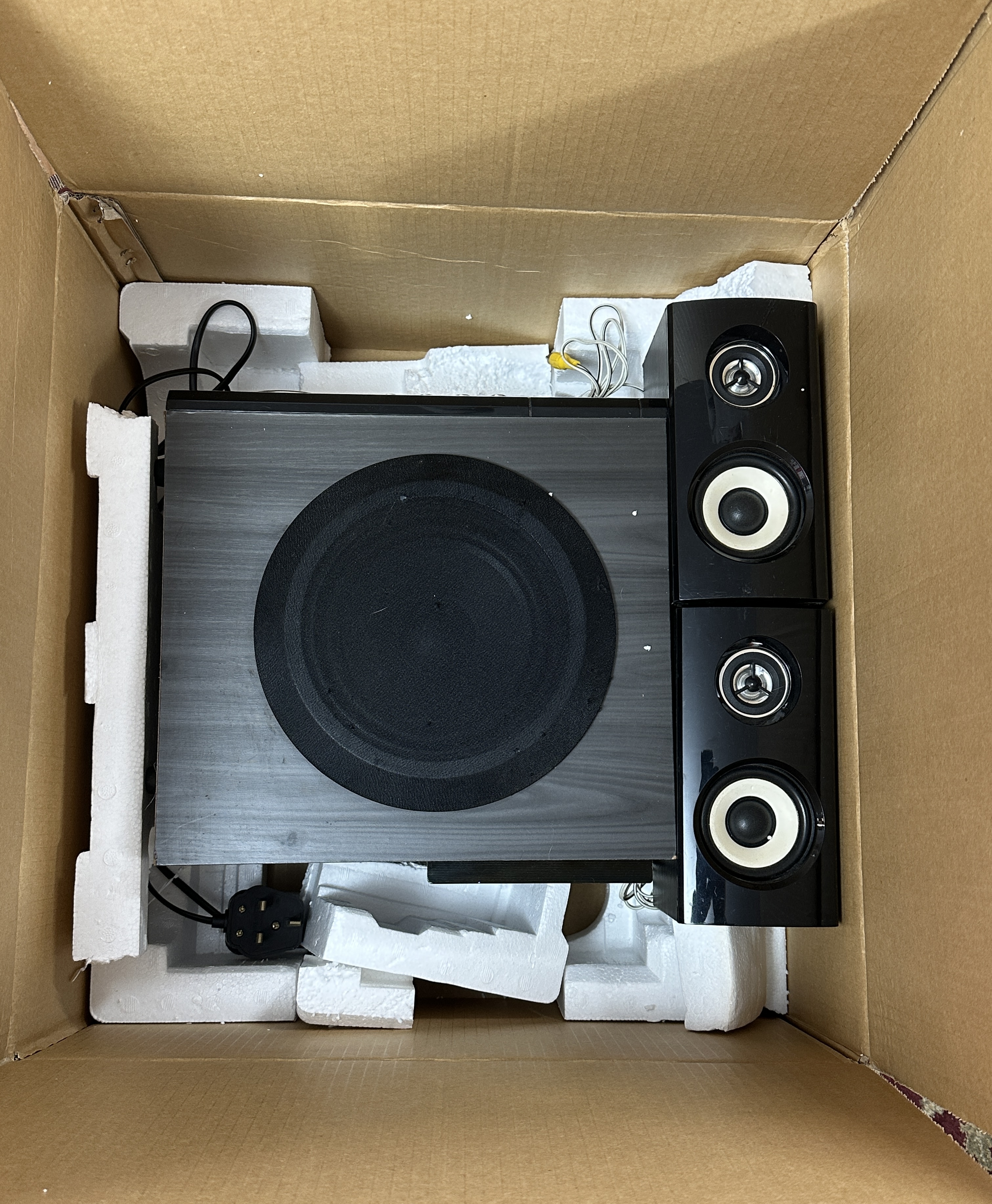 A Wharfedale Subwoofer and Two Matching Satellite Speakers