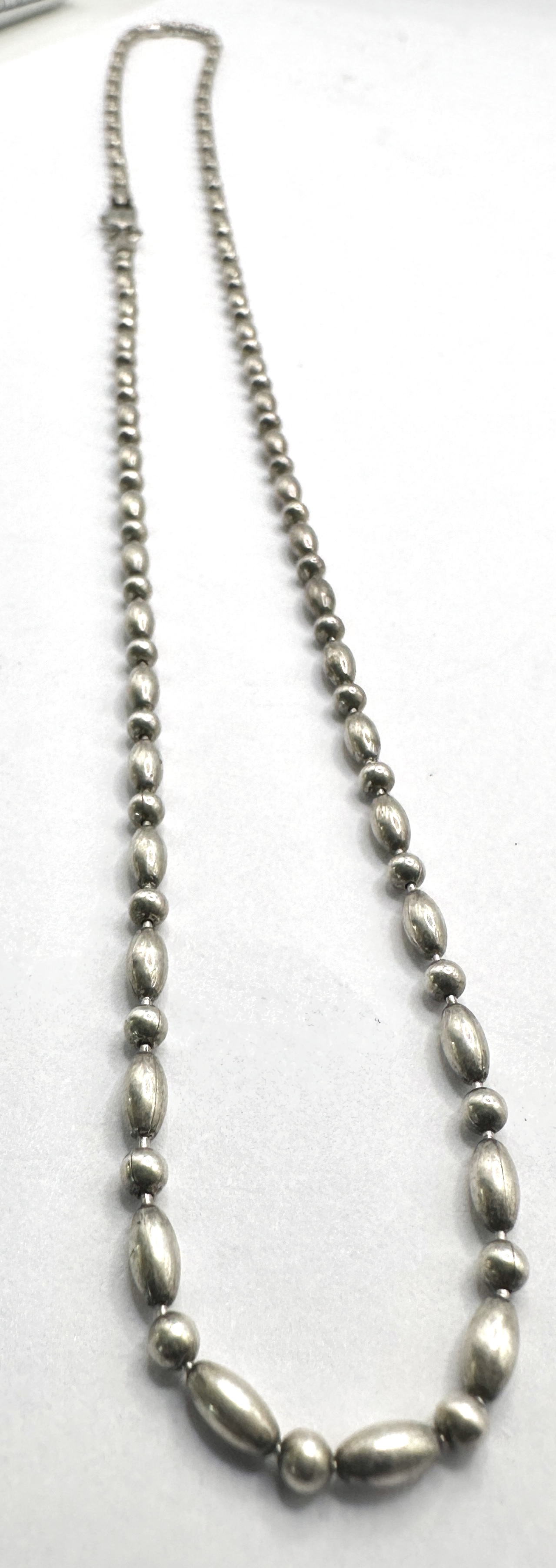A Graduated 925 Silver Elongated Bead Necklace