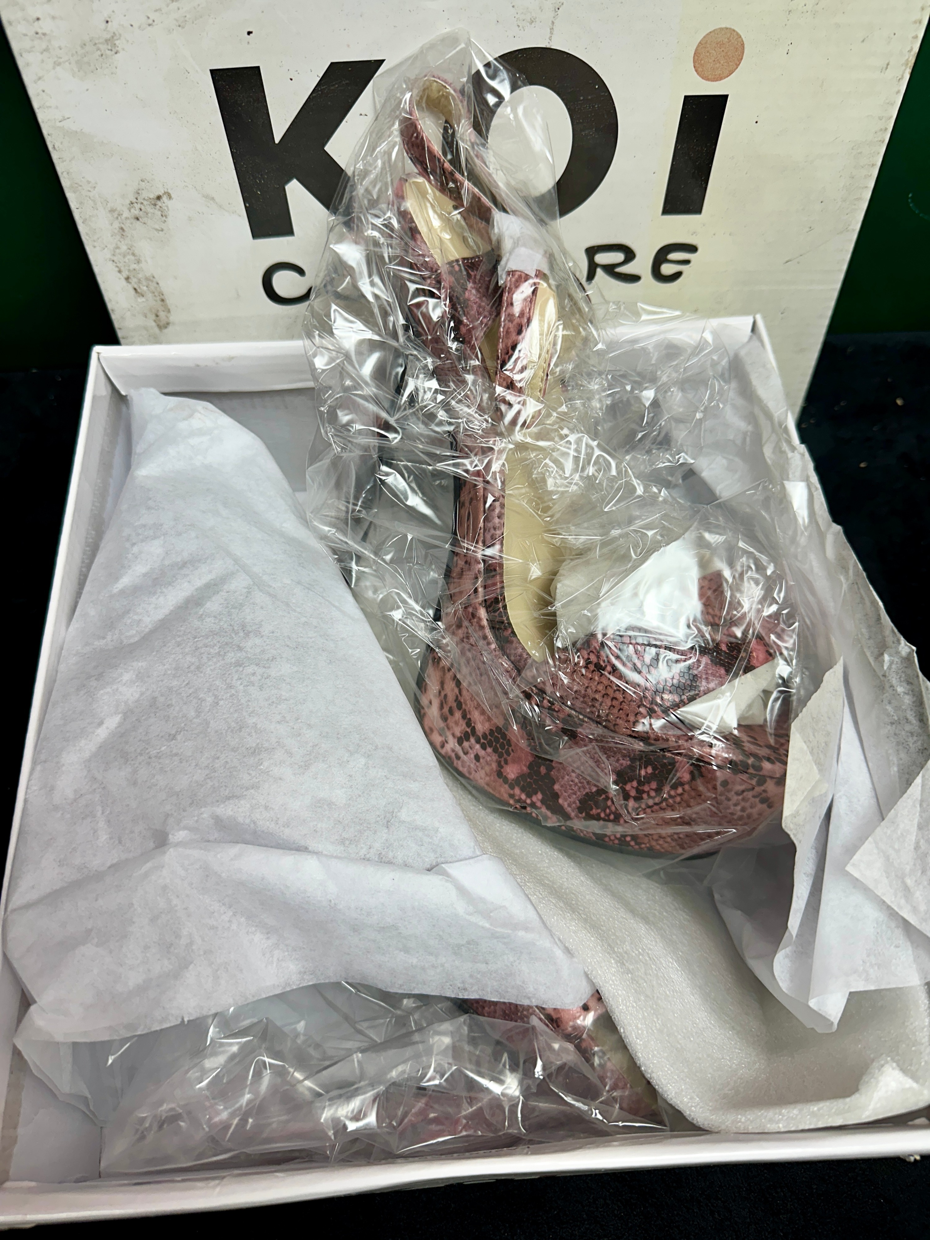 A Pair of Koi Couture XD20 Platform Stiletto Sandals